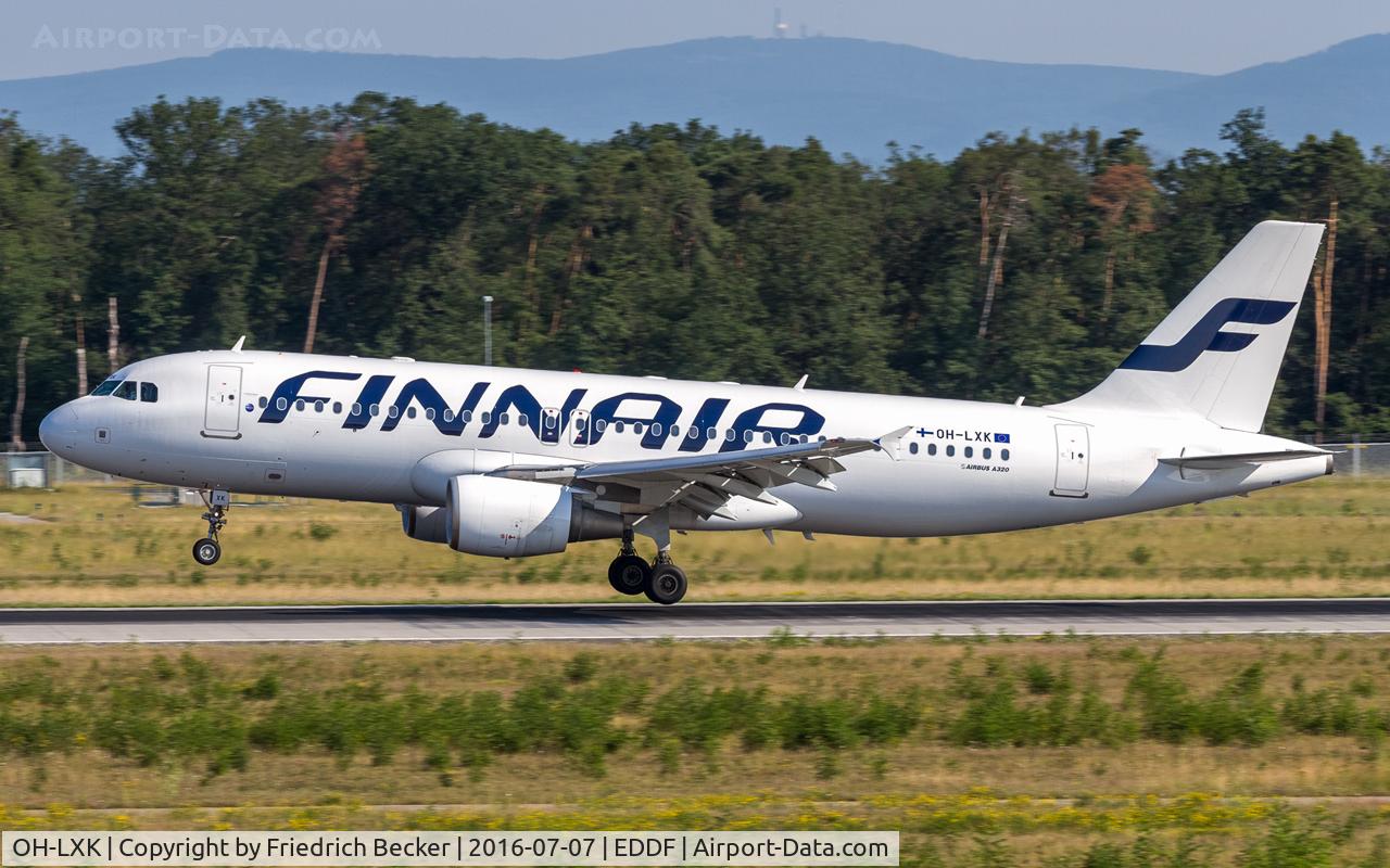 OH-LXK, 2003 Airbus A320-214 C/N 2065, touchdown on RW25R