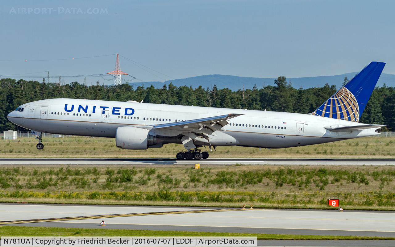 N781UA, 1996 Boeing 777-222 C/N 26945, decellerating after touchdown on RW25R