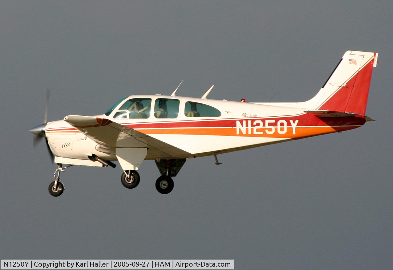 N1250Y, 1966 Beech 35-C33 Debonair C/N CD-1039, landing on runway 23