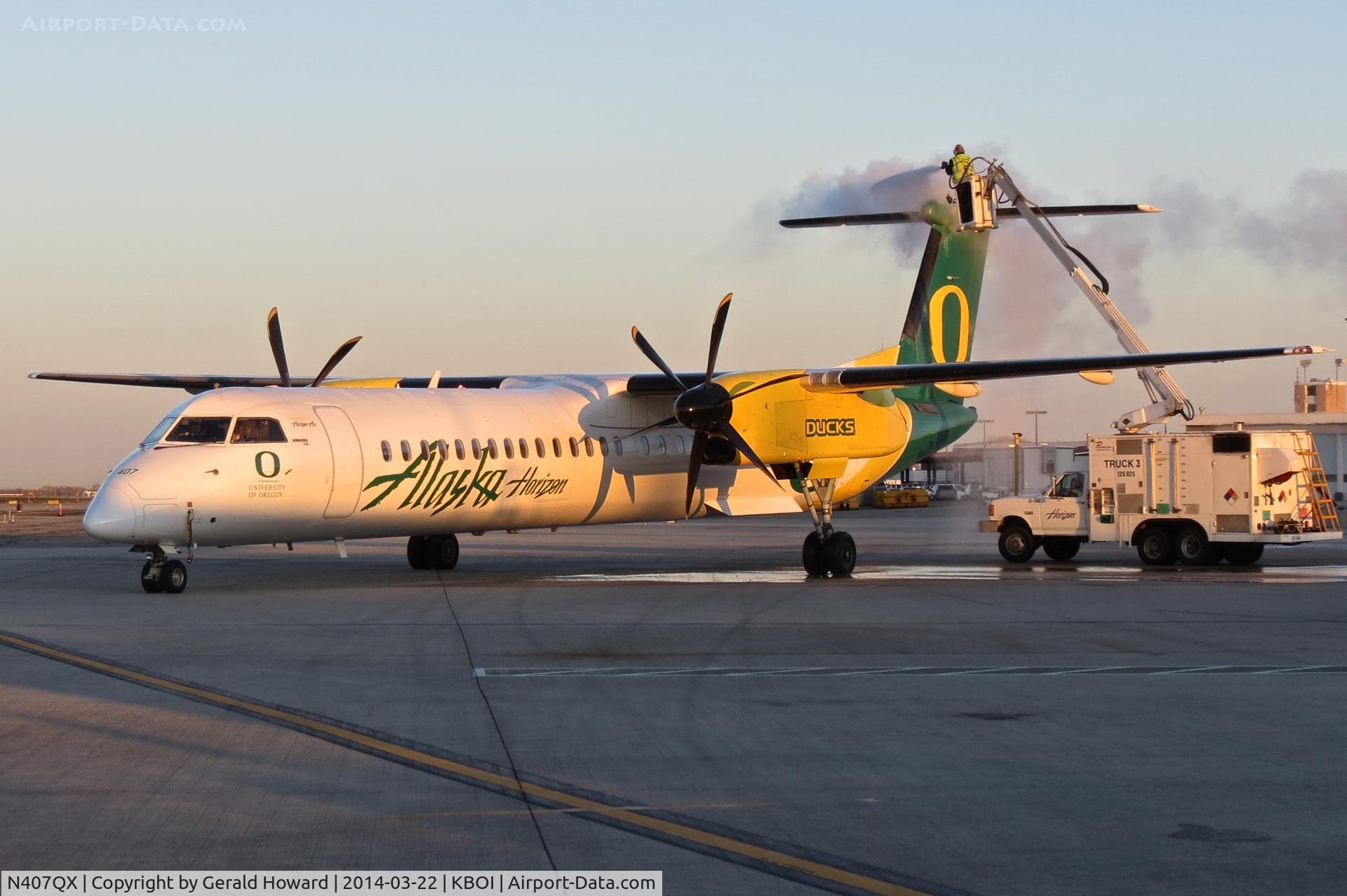 N407QX, 2001 Bombardier DHC-8-402 Dash 8 C/N 4049, Early morning de ice.
