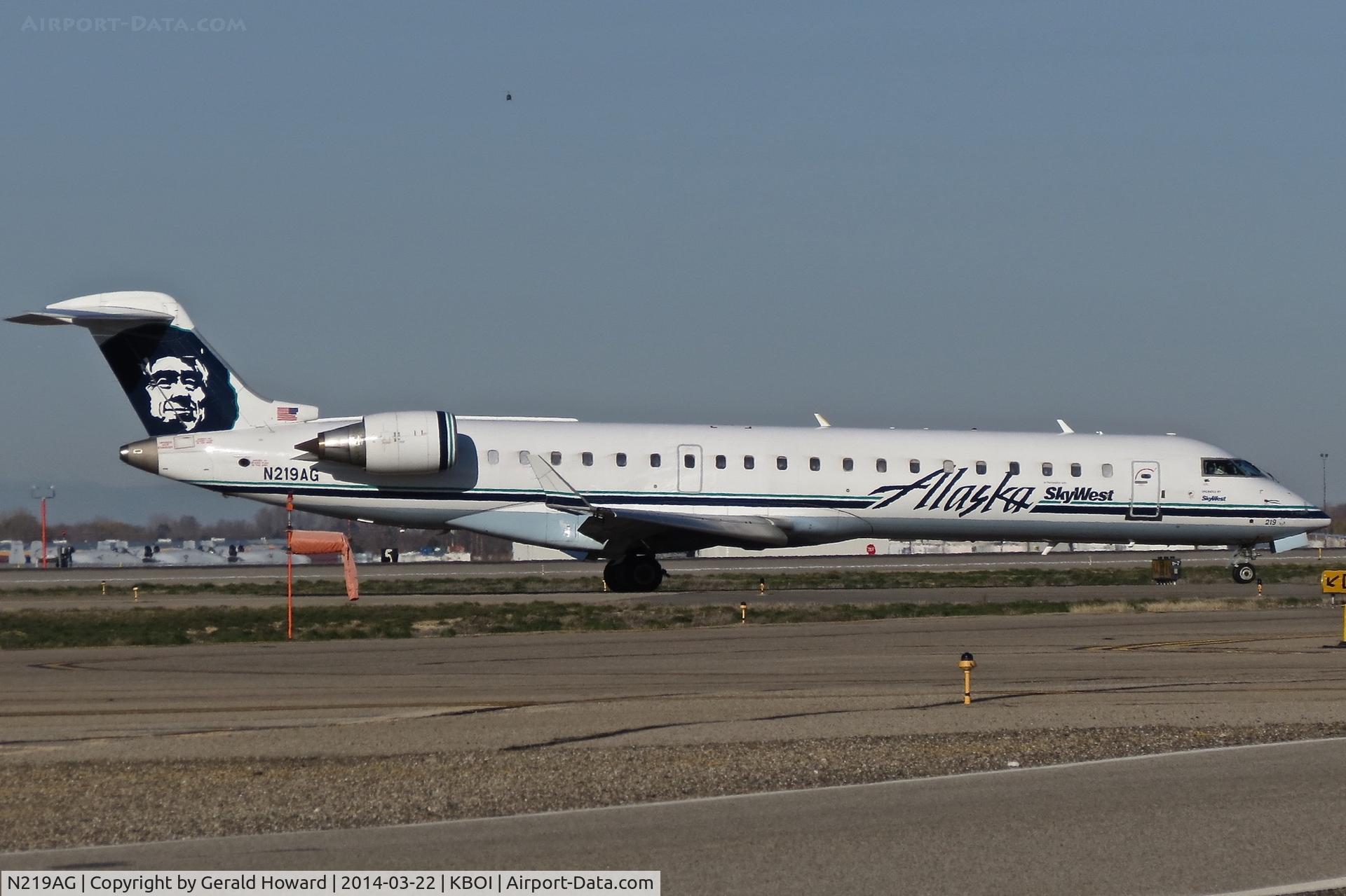 N219AG, 2006 Bombardier CRJ-701 (CL-600-2C10) Regional Jet C/N 10246, Turning off RWY 10L.