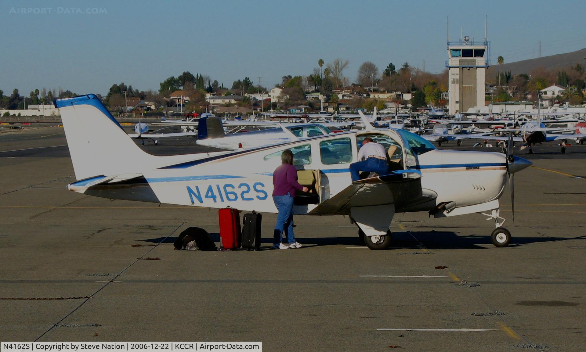N4162S, 1975 Beech F33A Bonanza C/N CE-568, Privately-owned Beech 1975 Beech F33A Bonanza from Louisiana for the holidays parked on Hotel visitor's ramp @ Buchanan Field, Concord, CA