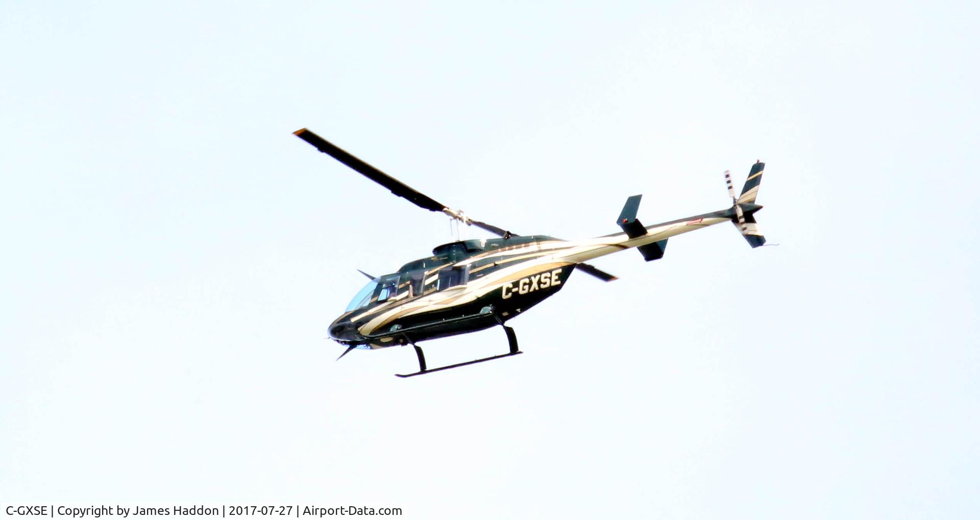 C-GXSE, 1977 Bell 206L LongRanger C/N 45123, Heading north from Barrie,Ontario.