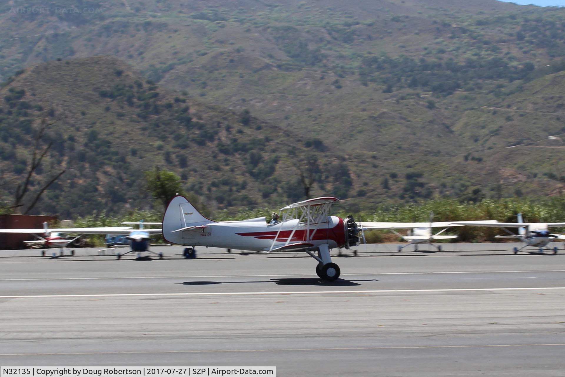 N32135, 1941 Waco UPF-7 C/N 5767, 1941 Waco UPF-7, Continental W670 220 Hp radial, one of the prettiest classic biplanes, chrome plated prop/spinner, SZP-based & hangared, takeoff roll Rwy 22 tailwheel already up