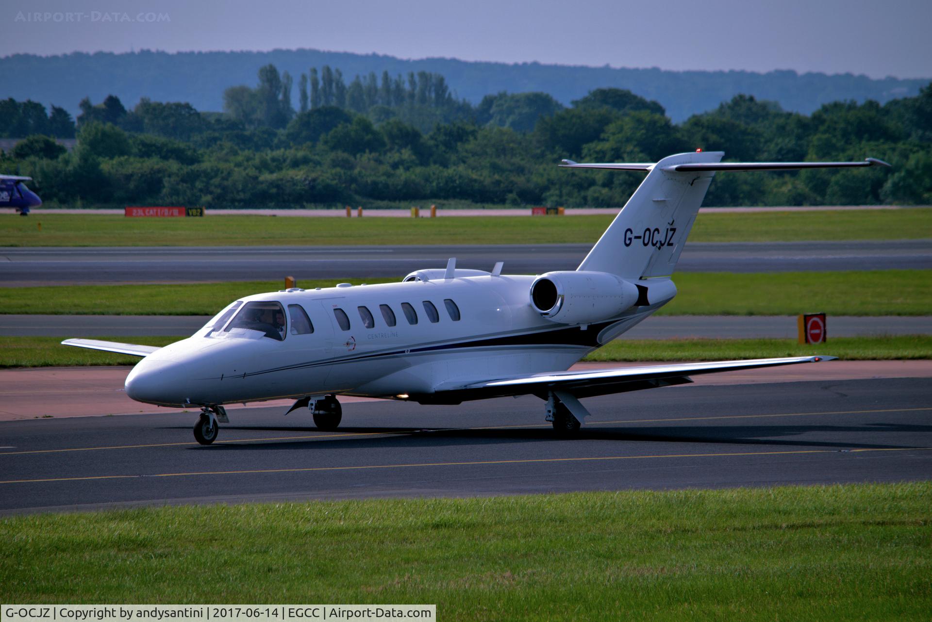 G-OCJZ, 1994 Cessna 525A CitationJet CJ2 C/N 525A-0051, taxing in to the [FBO exc ramp]
