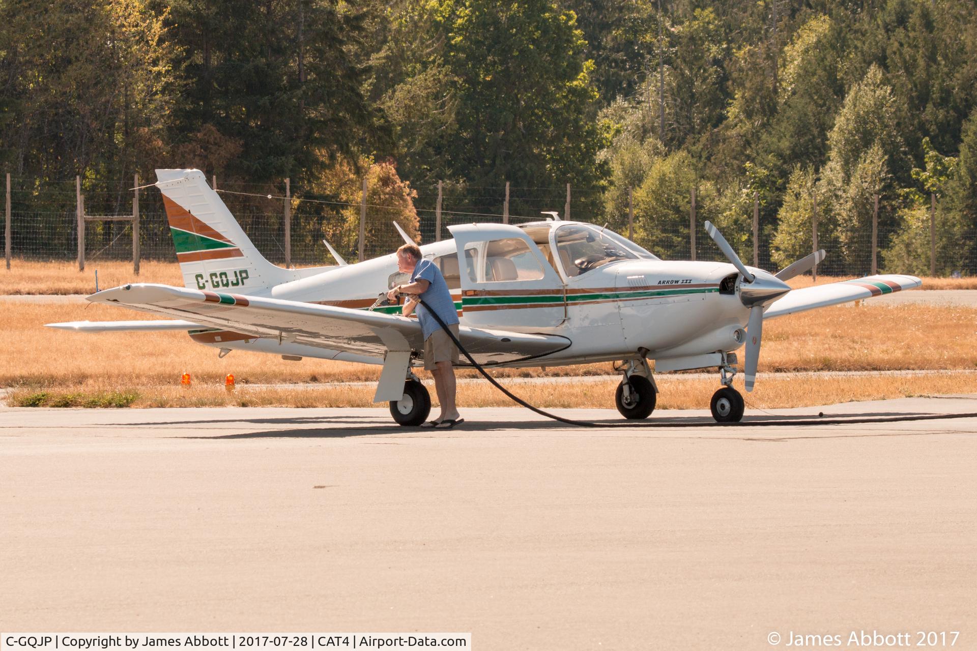 C-GQJP, 1977 Piper PA-28R-201T Cherokee Arrow III C/N 28R-7703096, Fueling up at Qualicum Beach