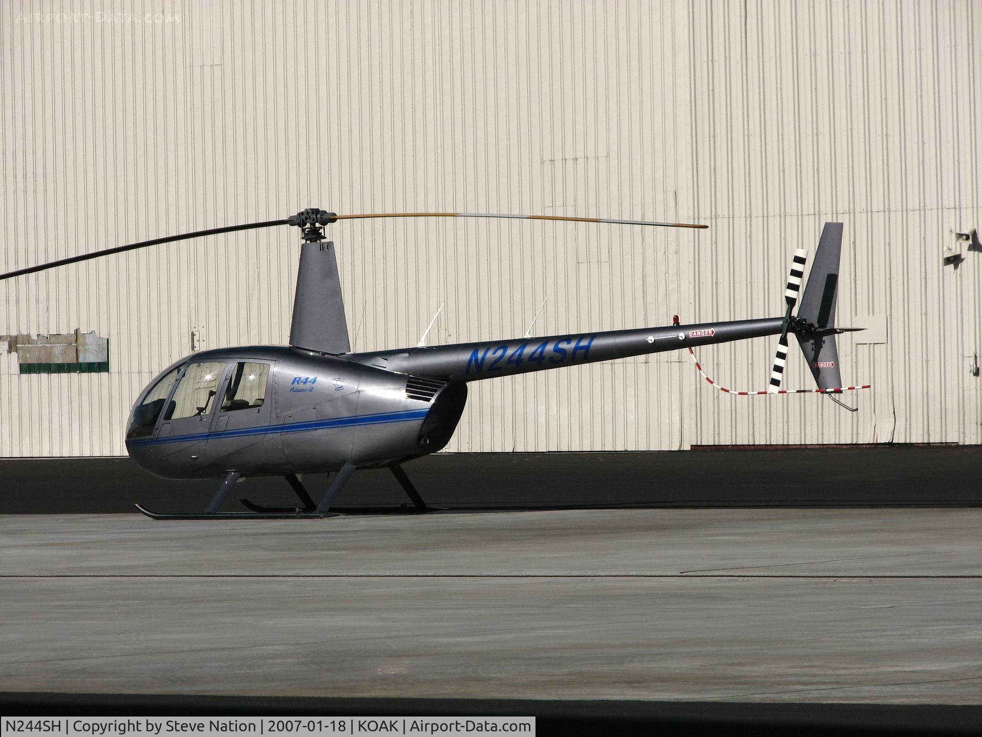 N244SH, 2005 Robinson R44 II C/N 10806, Silver State Helicopters 2005 Robinson R44 II @ Oakland International Airport, CA North ramp (to N98VL 2009-01-16)