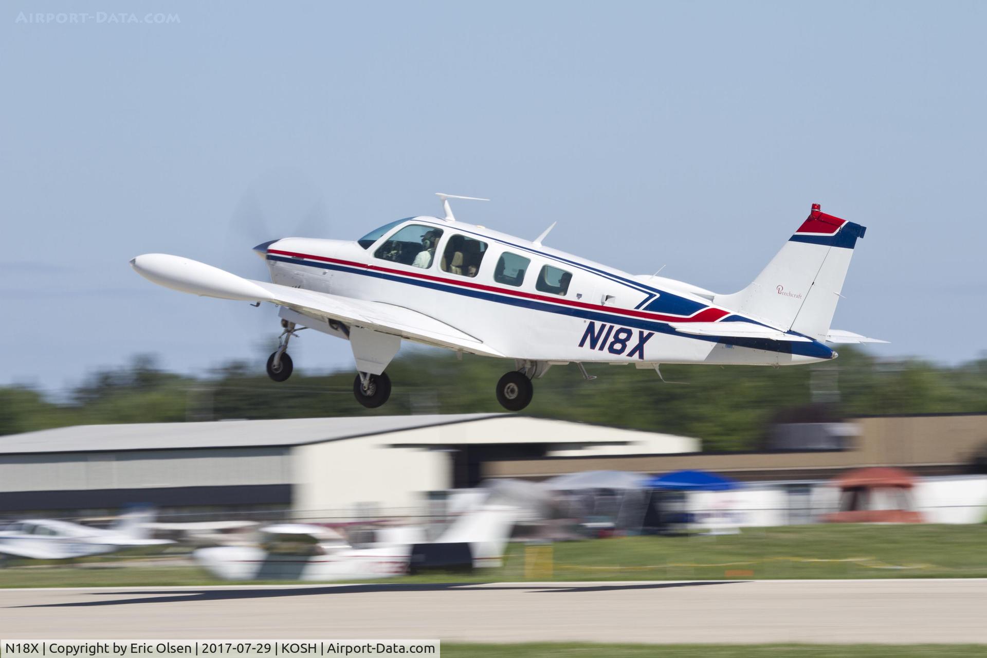 N18X, 1978 Beech A36 Bonanza 36 C/N E-1353, Beech A36 taking off from KOSH