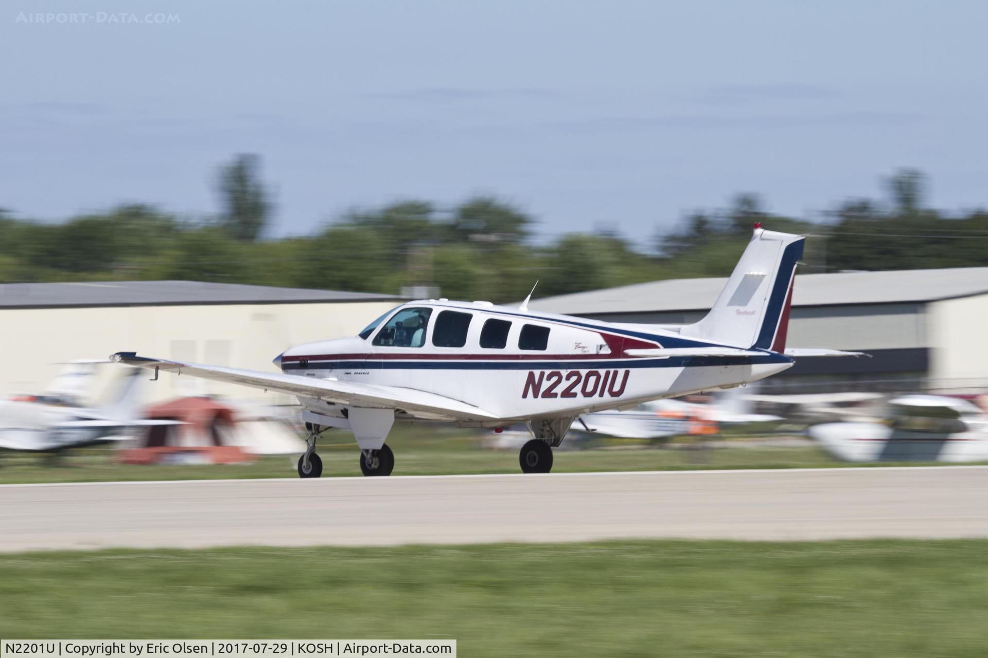 N2201U, 1997 Raytheon Aircraft Company B36TC Bonanza C/N EA-601, Raytheon departing KOSH