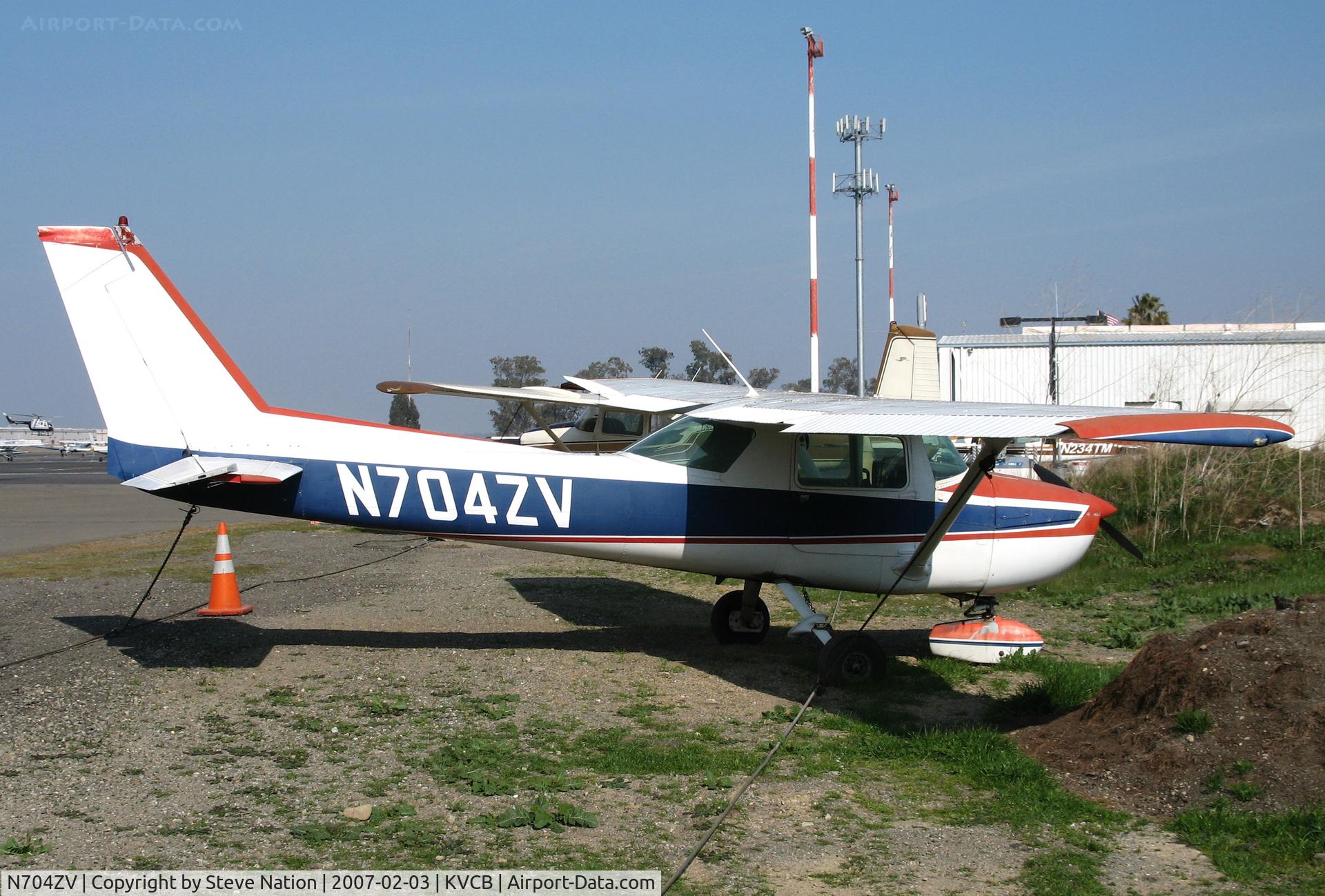 N704ZV, 1976 Cessna 150M C/N 15079011, Locally-based 1976 Cessna 150M in the weeds @ Nut Tree Airport, Vacaville, CA (sold to Sharman Enterprises, Vacaville 2010-03-04 and cancelled from USCAR 2012-05-23 as exported to South Africa)
