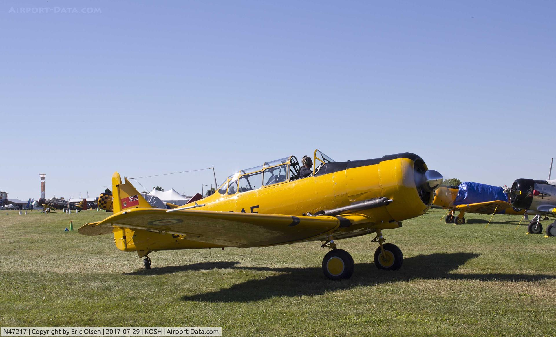 N47217, 1951 Canadian Car & Foundry Harvard MK IV C/N CCF4-8, Harvard taxing out of the warbird area at Airventure.