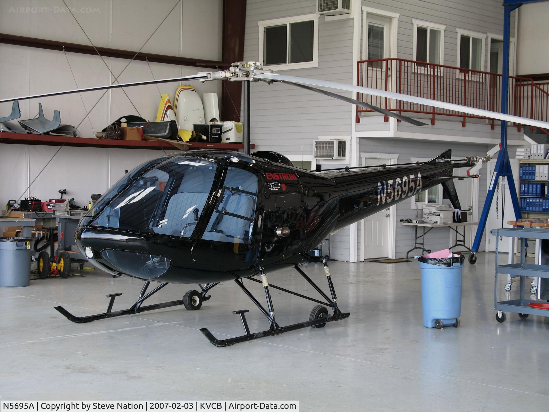 N5695A, Enstrom 280C Shark C/N 1201, Locally-based 1980 Enstrom 280C in open hangar @ Nut Tree Airport, Vacaville, CA