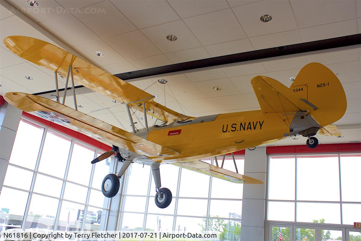 N61816, 1942 Boeing A75N1 C/N 75-1121, On display in the showroom of the Le Mieux Toyota dealership on South Oneida Street in Green Bay , Wisconsin