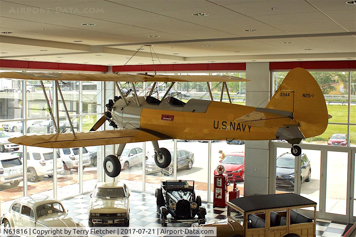 N61816, 1942 Boeing A75N1 C/N 75-1121, On display in the showroom of the Le Mieux Toyota dealership on South Oneida Street in Green Bay , Wisconsin