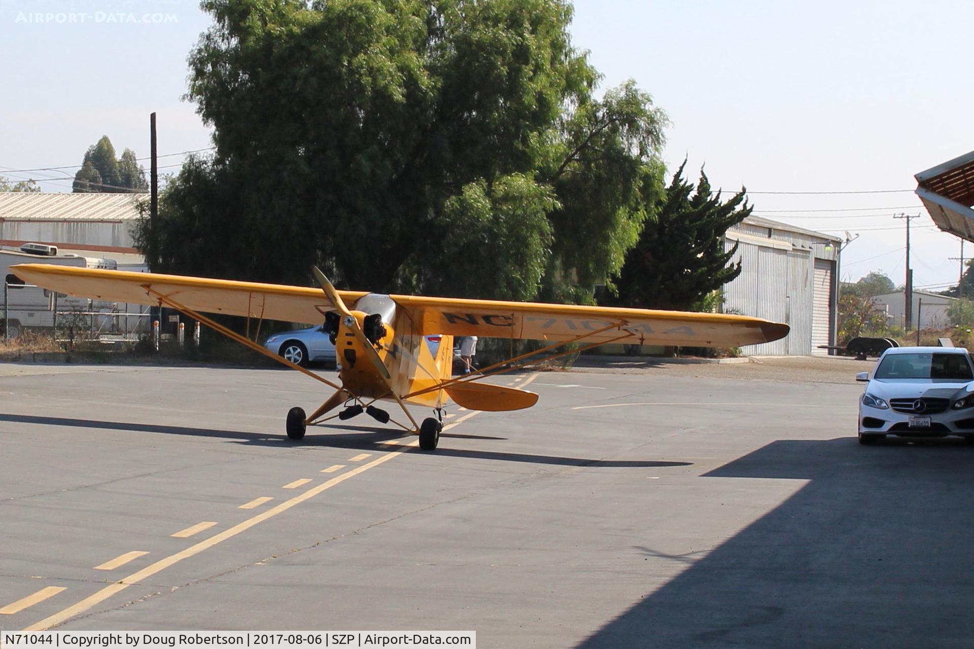 N71044, 1946 Piper J3C-65 Cub Cub C/N 18064, 1946 Piper J3C-65 CUB, Continental A&C-65 65 Hp, at its hangar ramp