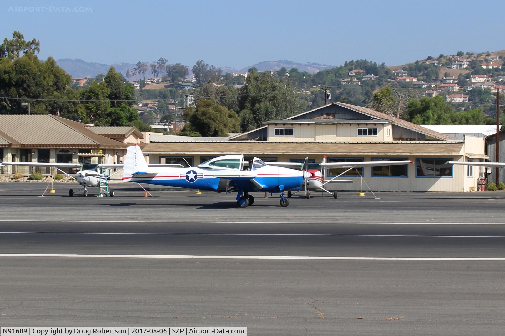 N91689, 1946 North American Navion (NA-145) C/N NAV-4-431, 1946 North American NAVION, Continental E225 upgrade, taxi back after arrival landing Rwy 22. Will give Young Eagles rides today.