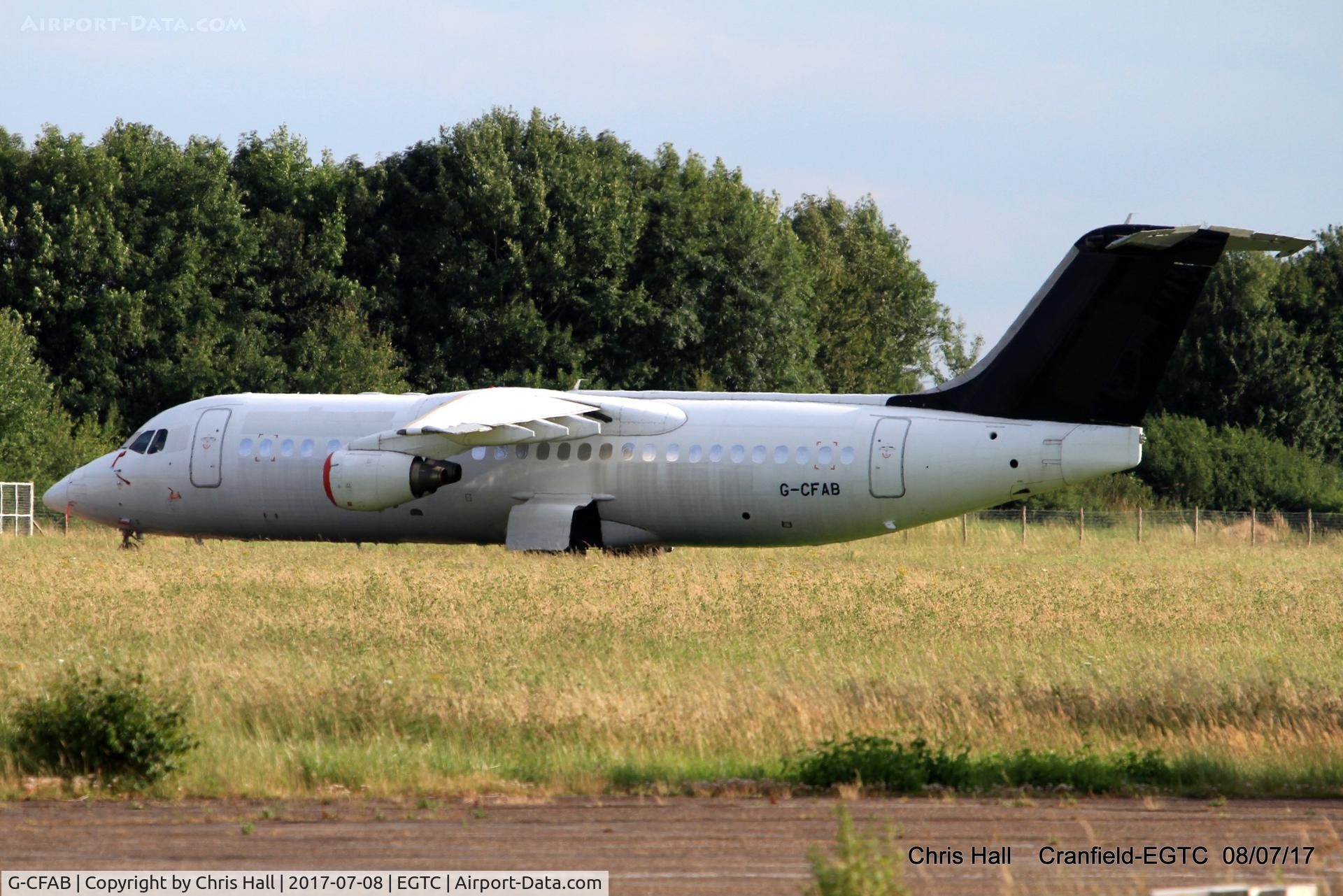 G-CFAB, 2000 British Aerospace Avro 146-RJ100 C/N E3377, stored at Cranfield