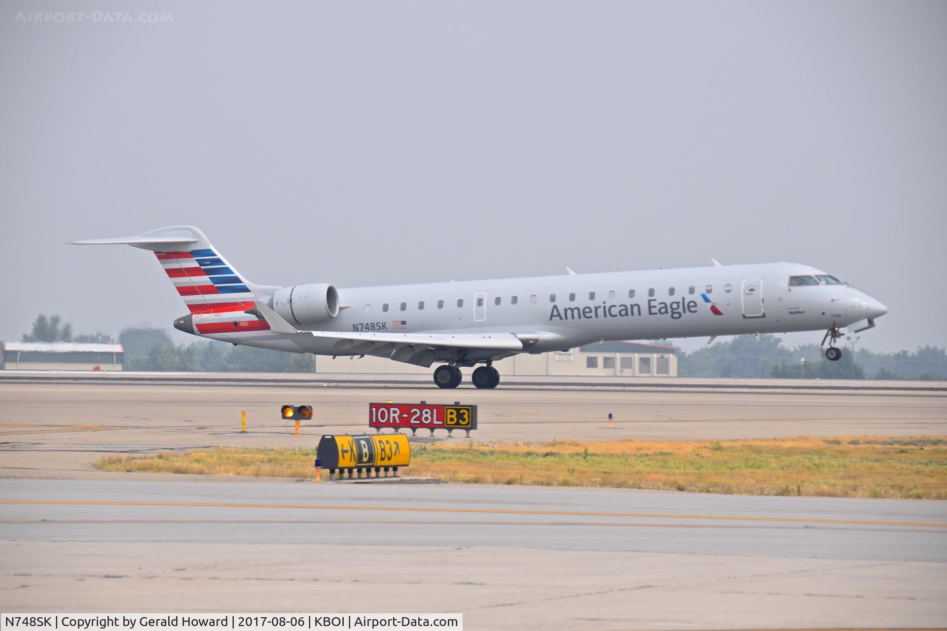 N748SK, 2005 Bombardier CRJ-700 (CL-600-2C10) Regional Jet C/N 10203, Landing RWY 10R.