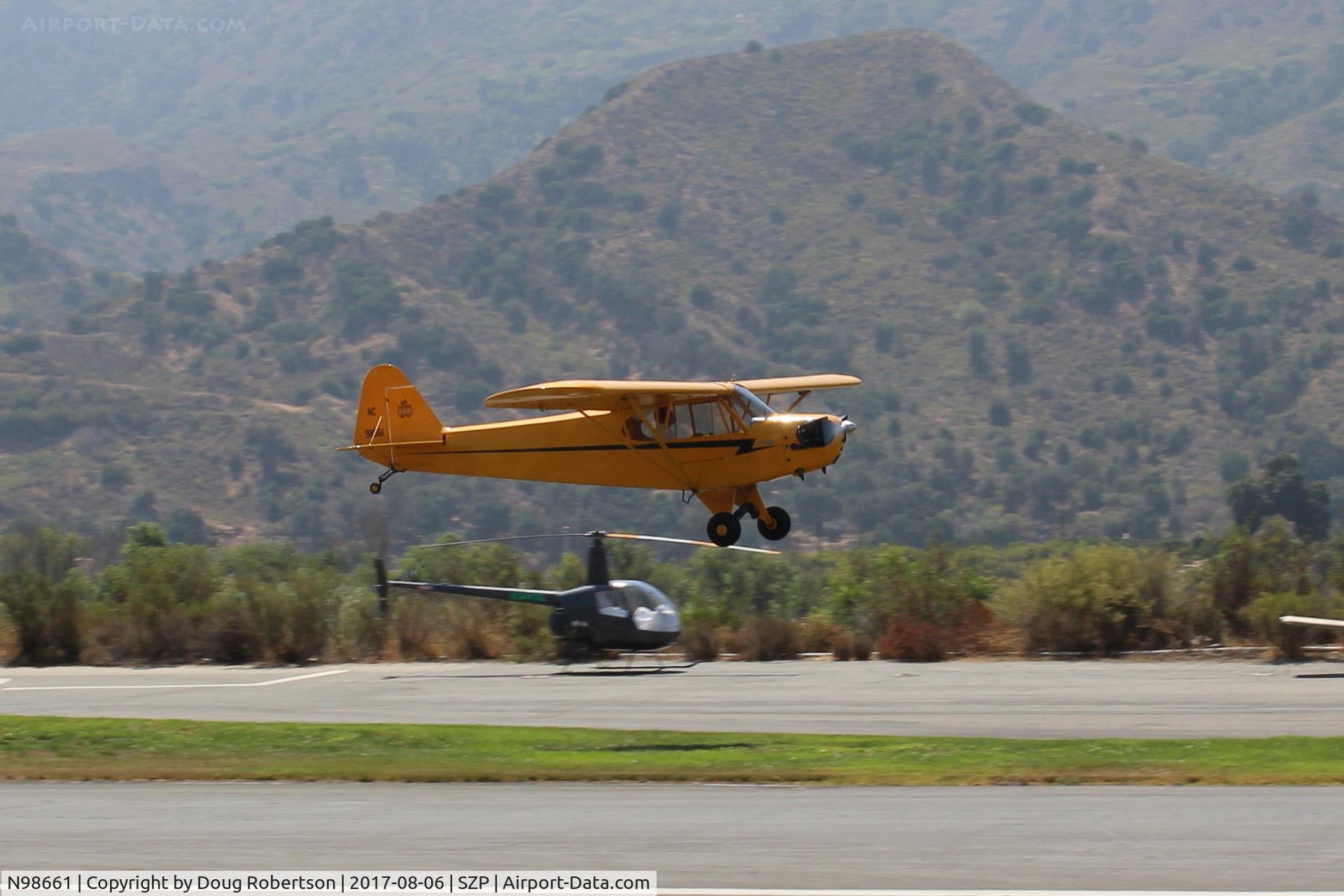 N98661, 1946 Piper J3C-65 Cub Cub C/N 18890, 1946 Piper J3C-65 CUB, Continental A&C75 75 Hp upgrade by STC, landing Rwy 22L grass