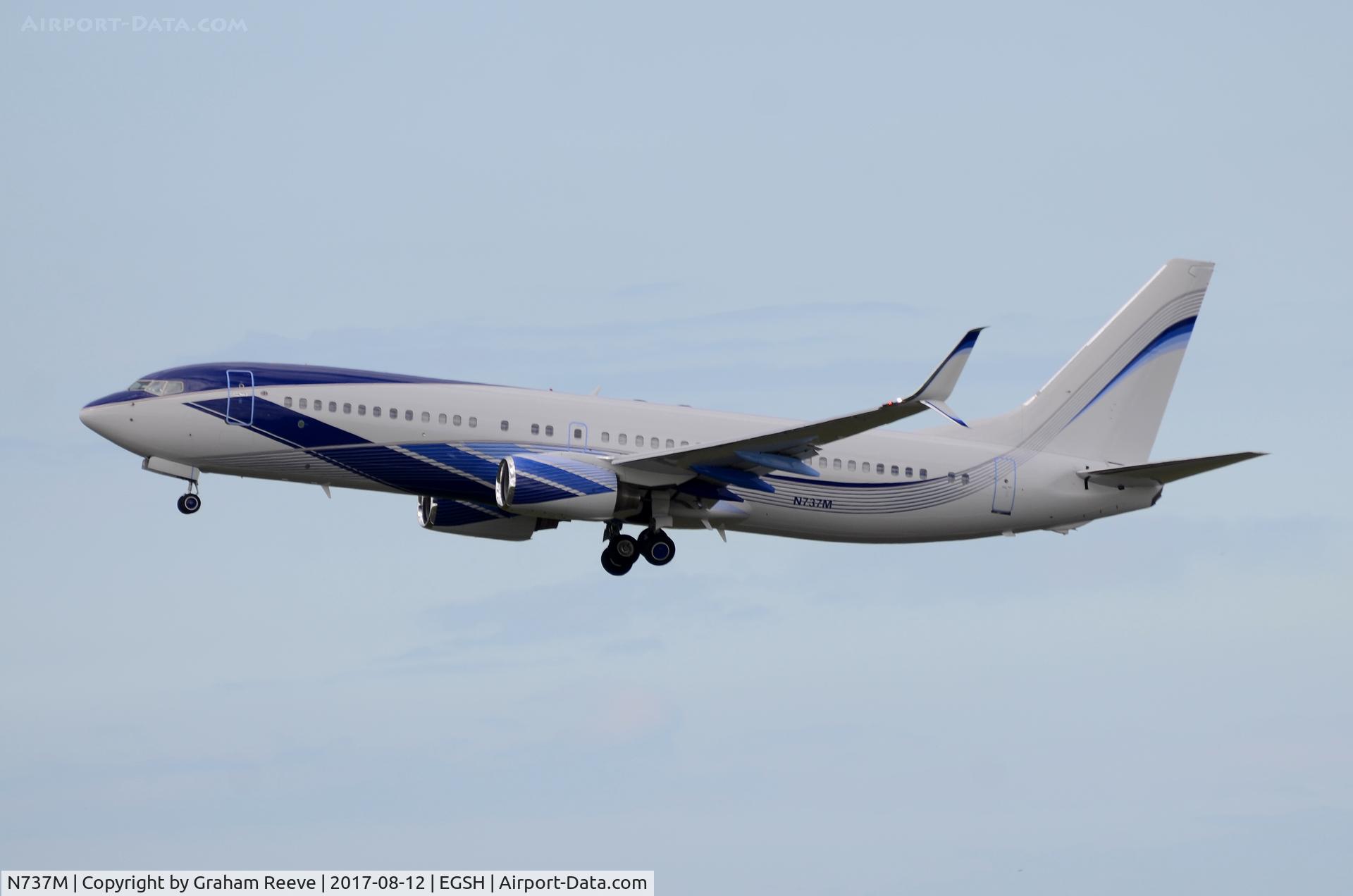N737M, 2002 Boeing 737-8EQ BBJ C/N 33361, Departing from Norwich.