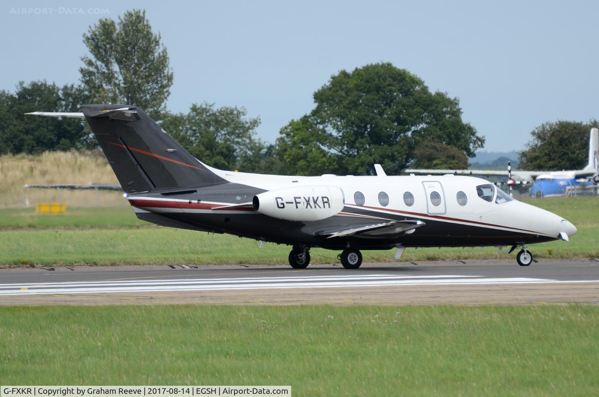 G-FXKR, 2000 Raytheon Beechjet 400A/Nextant N400XT C/N RK-279, About to depart from Norwich.