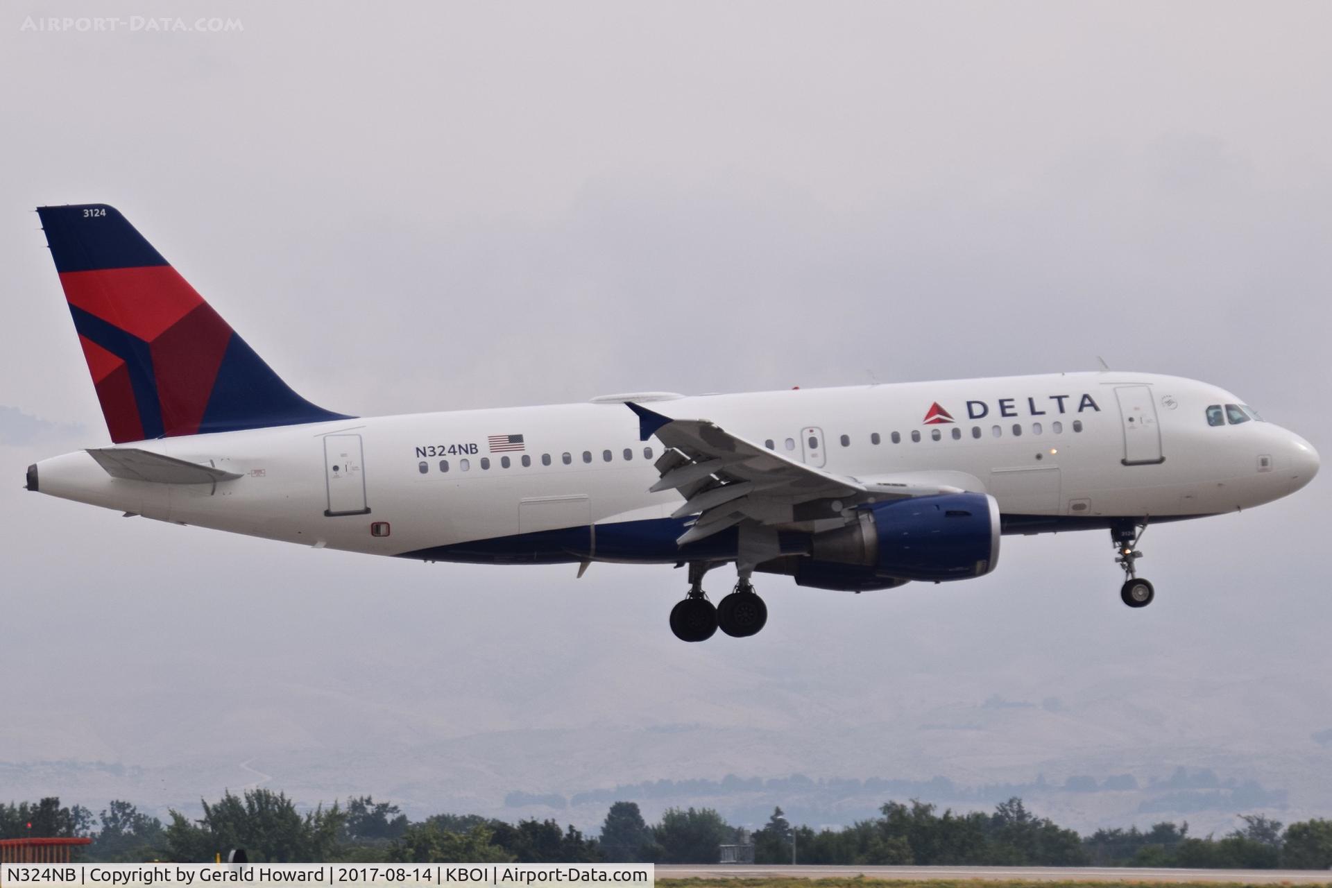 N324NB, 2001 Airbus A319-114 C/N 1456, Landing RWY 10R.
