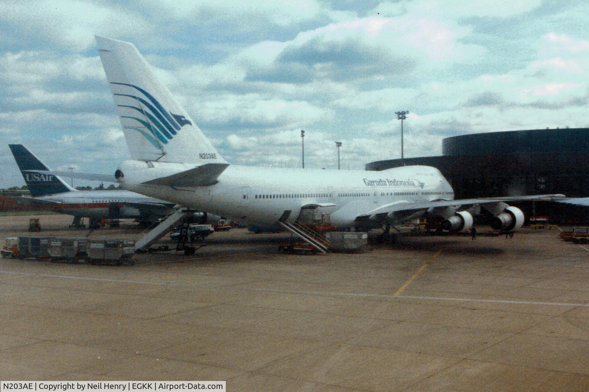 N203AE, 1975 Boeing 747-2B4B C/N 21098, Seen from departing flight at London Gatwick Airport in early September 1992.  Scanned from original print.