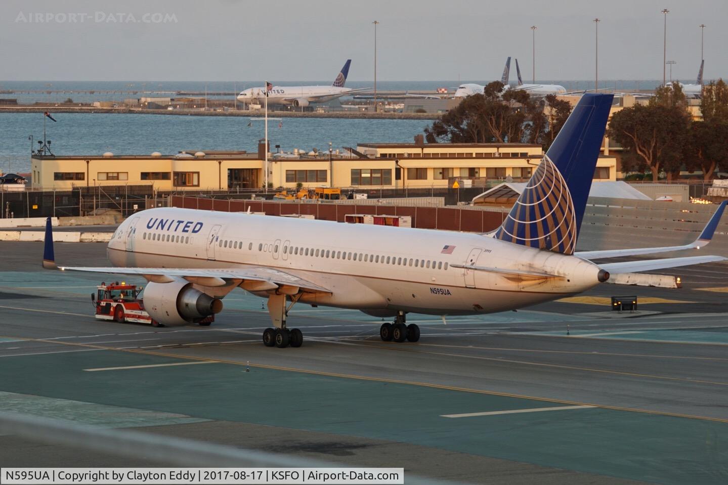 N595UA, 1998 Boeing 757-222 C/N 28748, Putting the cows in the barn for the night. SFO 2017.