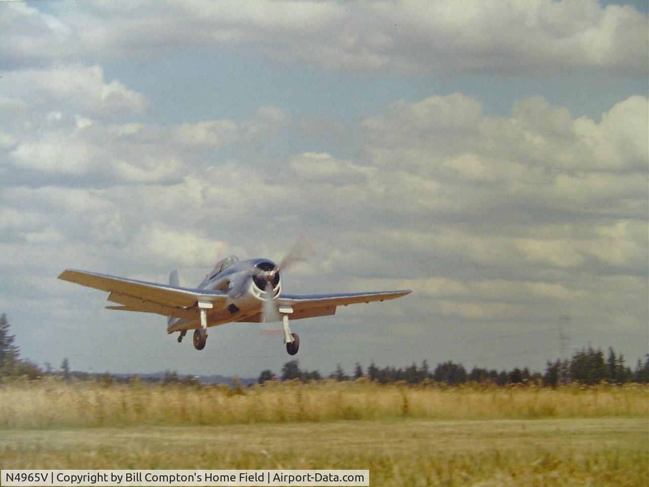 N4965V, Grumman F6F-3 Hellcat C/N 08825, I meet Bill Compton (B-25 Pilot) in the early 1970s at Abbotsford, Canada Airshow where he had his newly restored F6F-3 and we became friends fast...This picture he sent me, landing at his own private field.
He was a flower bulb farmer in Canby,Oregon.