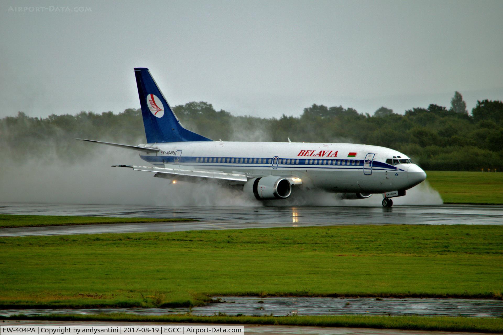 EW-404PA, 1992 Boeing 737-3L9 C/N 27061, just landed on a very wet runway 23R @ EGCC