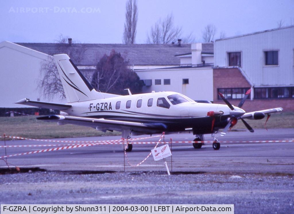 F-GZRA, 2003 Socata TBM-700 C/N 256, Parked at Socata parking...