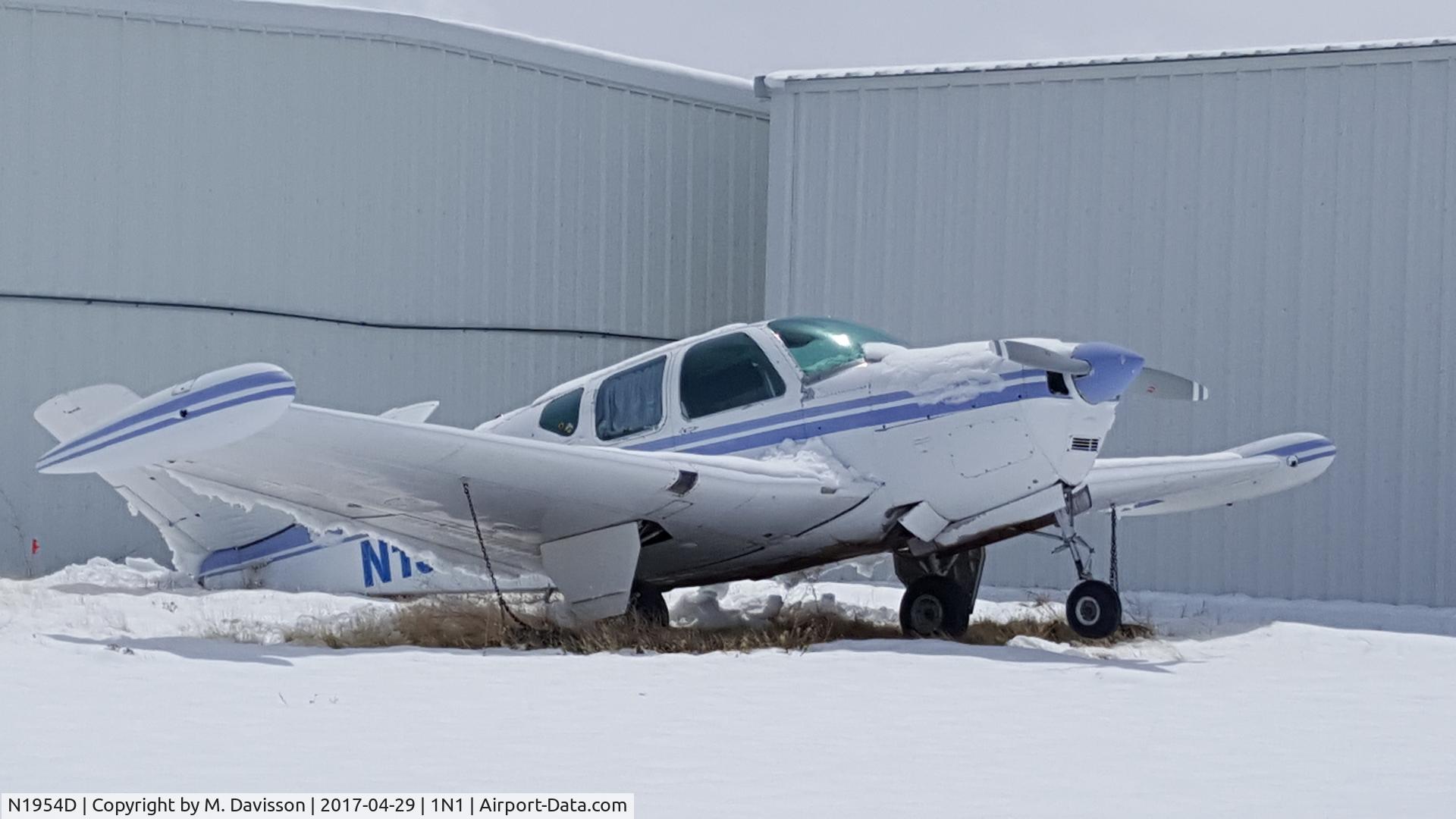 N1954D, 1952 Beech C35 Bonanza C/N D-3234, Tail down due to weight of snow.