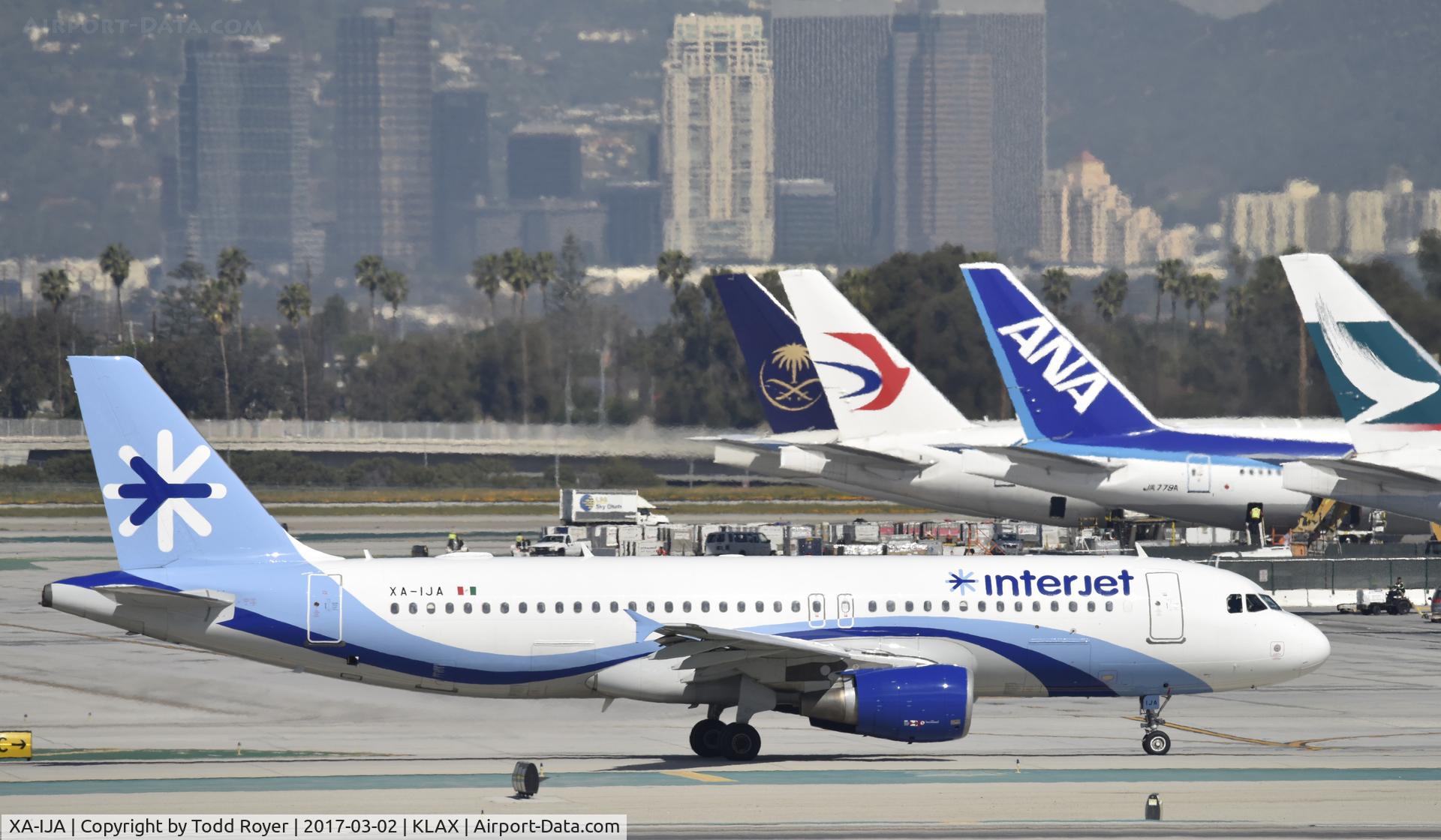 XA-IJA, 2000 Airbus A320-214 C/N 1244, Taxiing at LAX