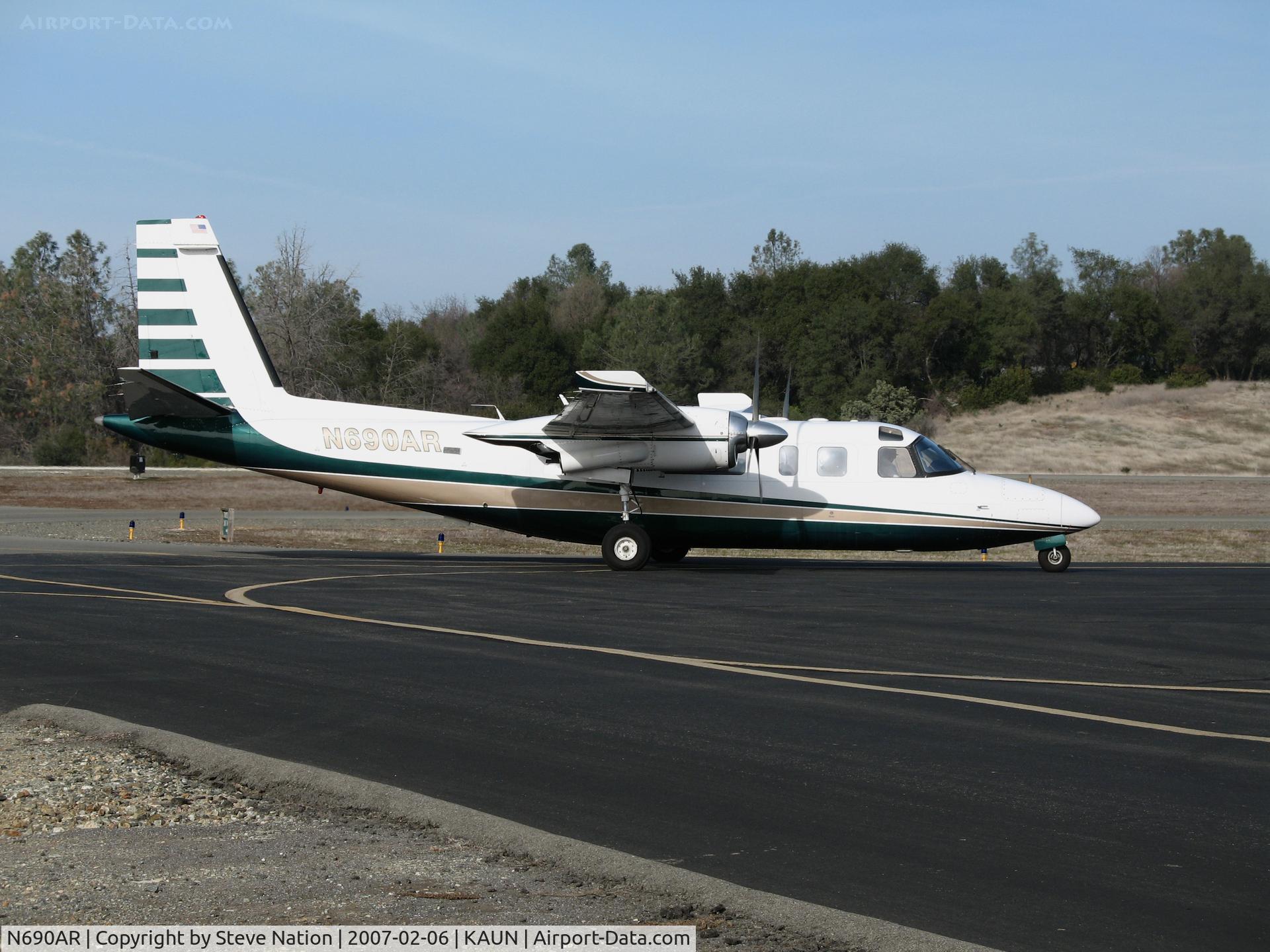 N690AR, 1974 Aero Commander 690A Turbo Commander C/N 11155, Visiting 1974 Aero Commander 690A Turbo Commander taxis in @ Auburn Municipal Airport, CA