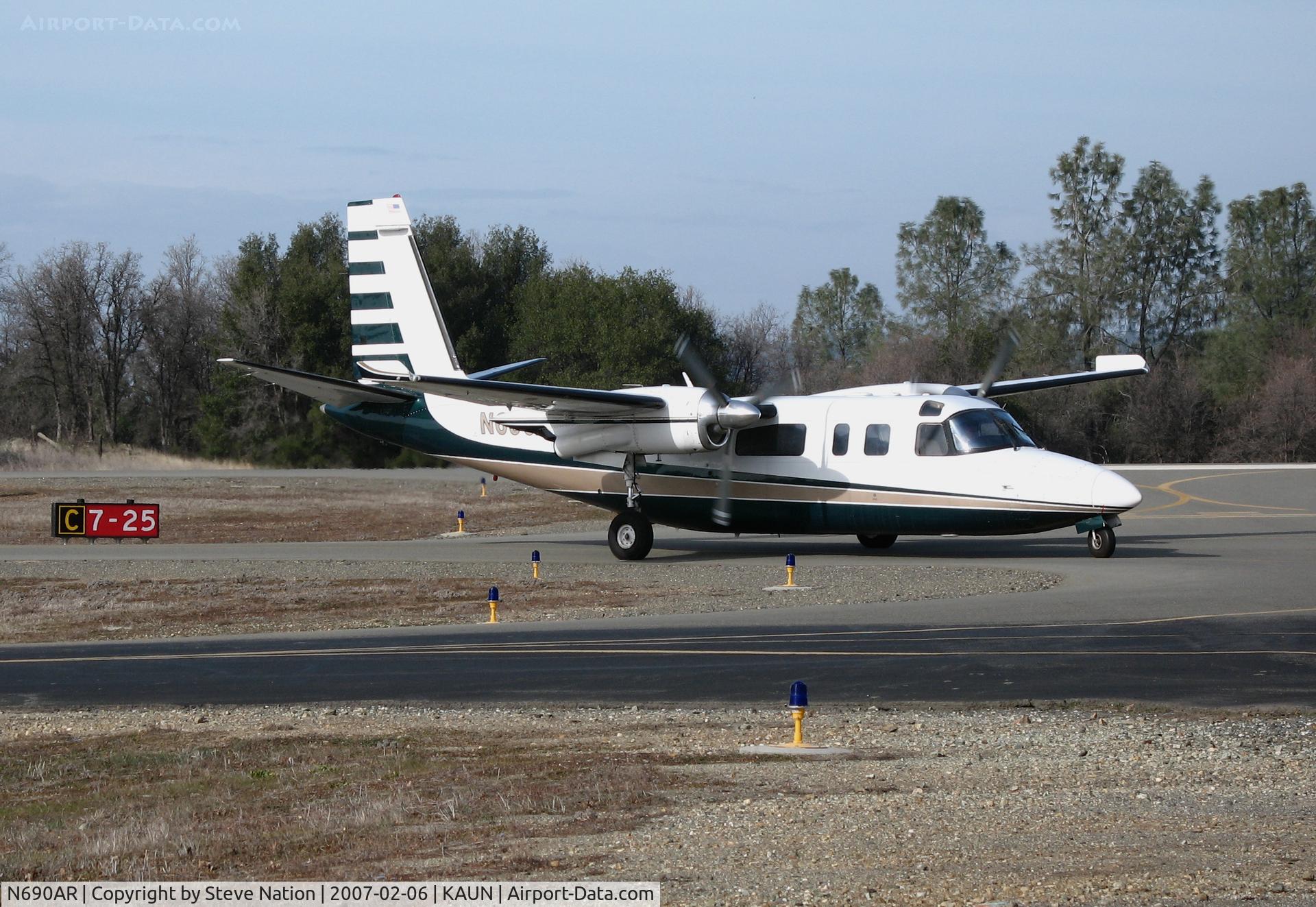 N690AR, 1974 Aero Commander 690A Turbo Commander C/N 11155, Visiting 1974 Aero Commander 690A Turbo Commander taxis in @ Auburn Municipal Airport, CA