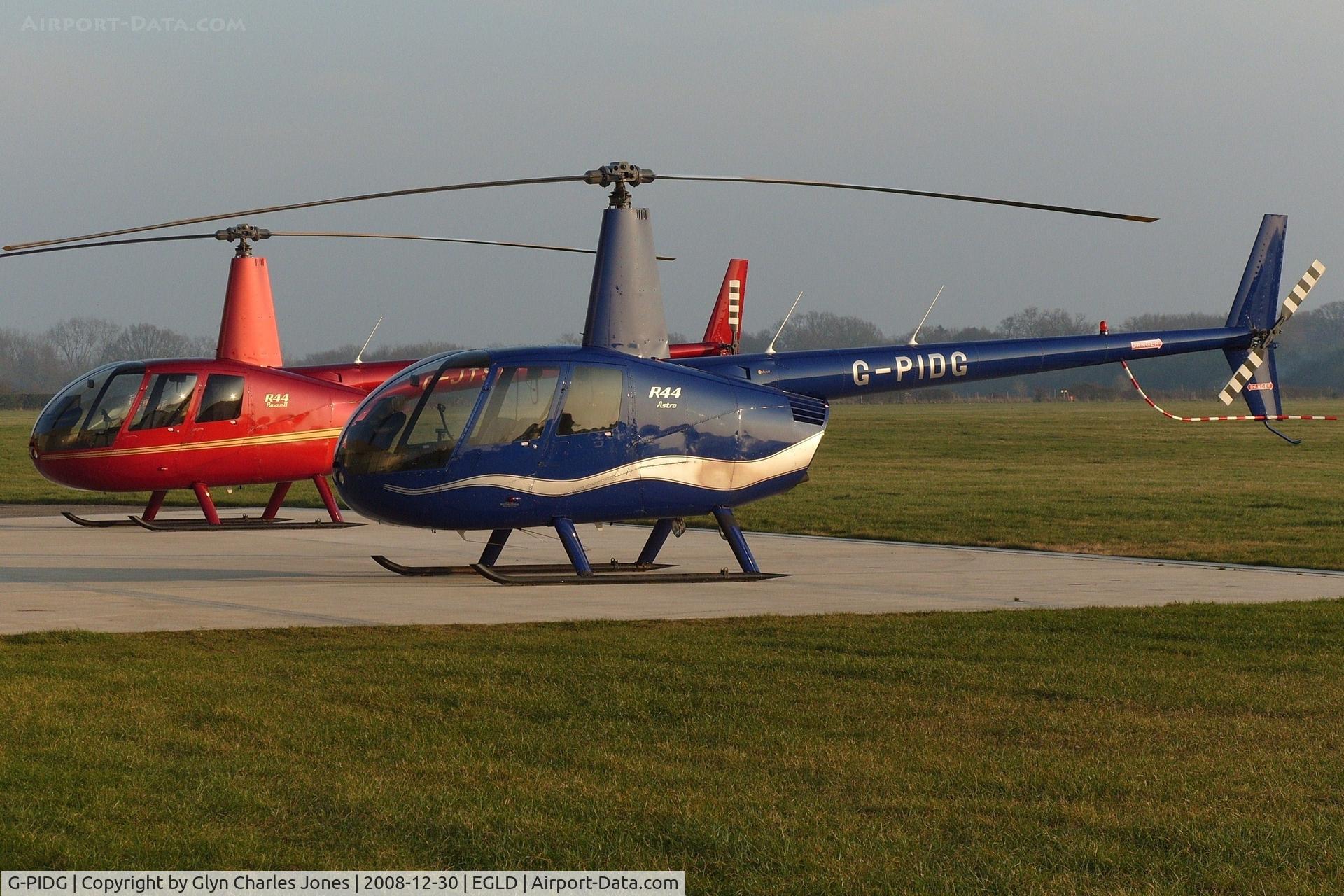 G-PIDG, 1999 Robinson R44 Astro C/N 0678, Privately owned.