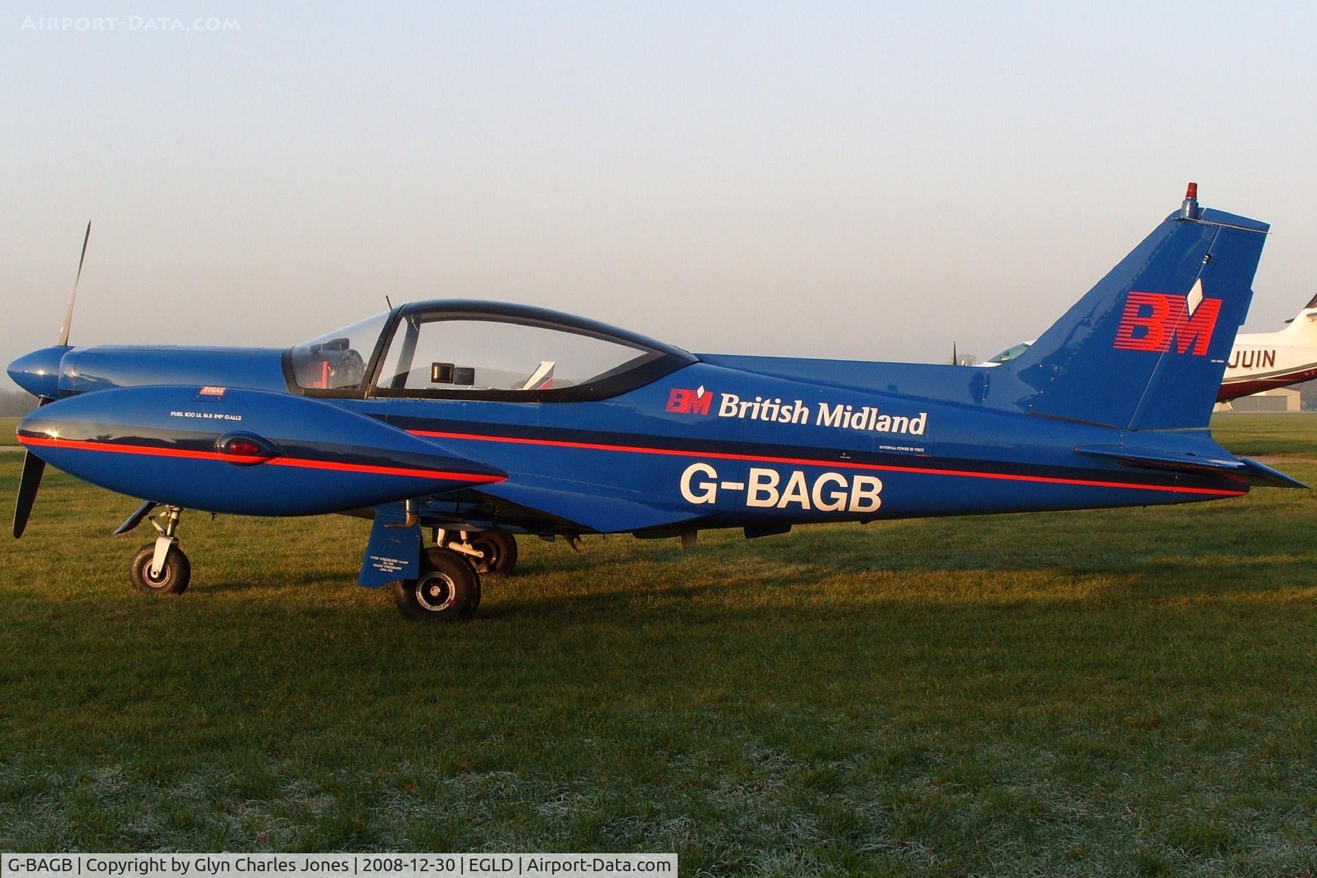 G-BAGB, 1968 SIAI-Marchetti SF-260 C/N 107, Previously LN-BIV. Missed getting a photo of this at Denham by 30 seconds two months earlier so great to see it tucked up in the corner of the visitor park. Owned by British Midland Airways. Different view.