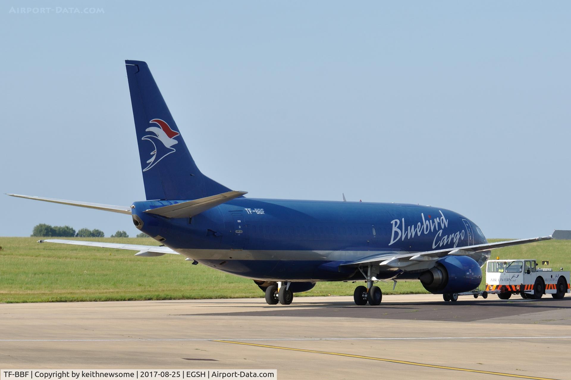 TF-BBF, 1992 Boeing 737-36E(SF) C/N 25264, Backlit tow to spray shop.