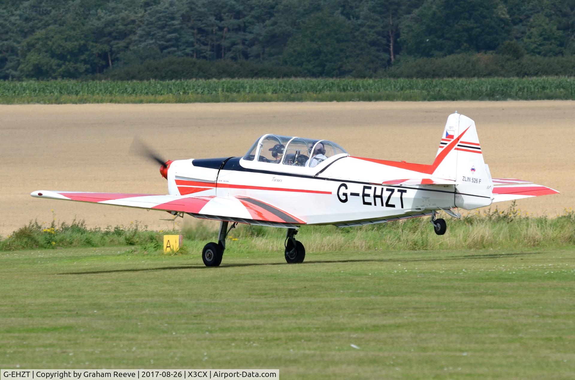 G-EHZT, 1974 Zlin Z-526F Trener Master C/N 1317, Departing from Northrepps.