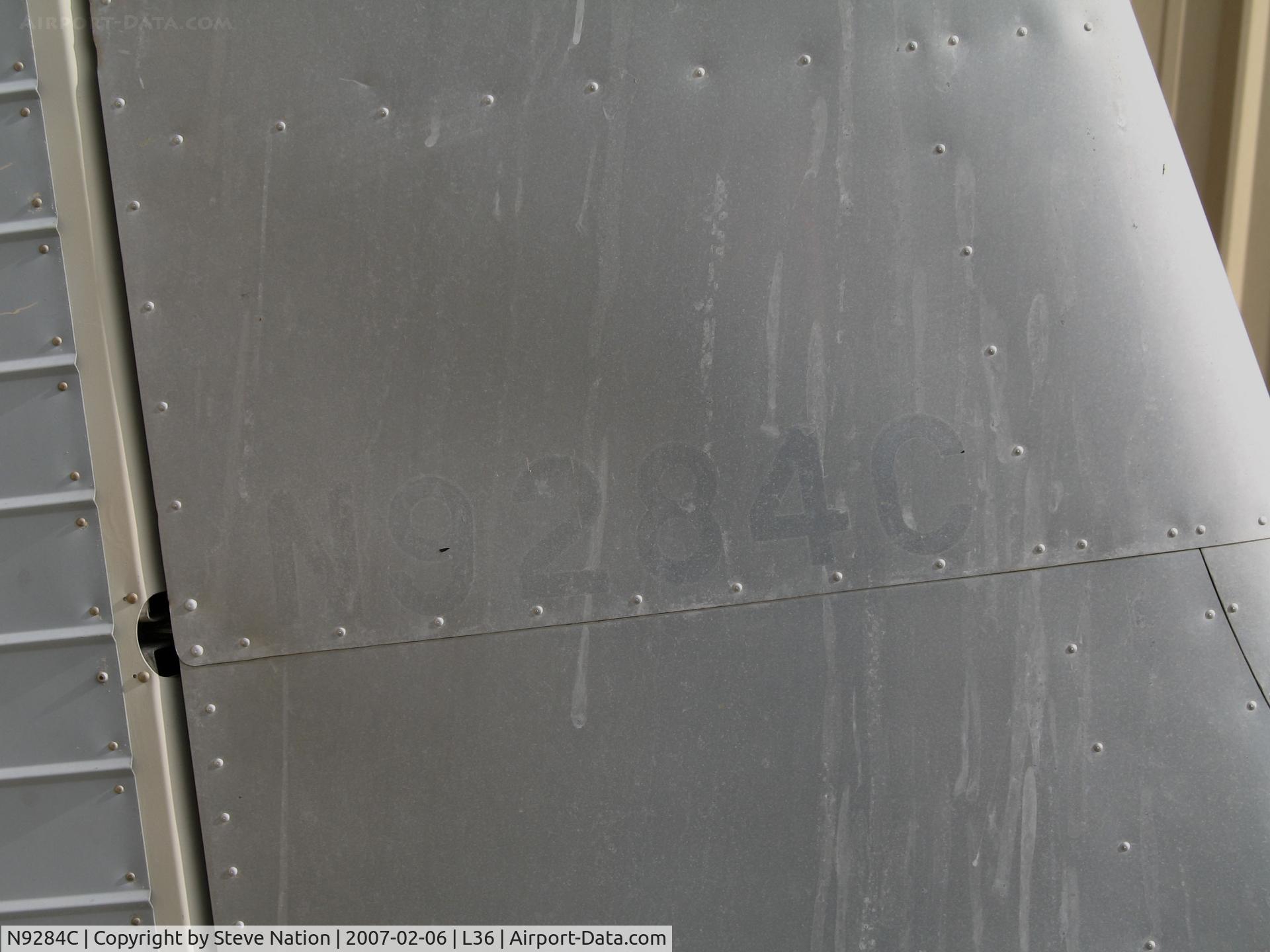 N9284C, 1955 Cessna 180 C/N 31383, close-up of tail showing faded registration on locally-based 1955 Cessna 180 @ Rio Linda Airport, CA (no longer on USCAR)