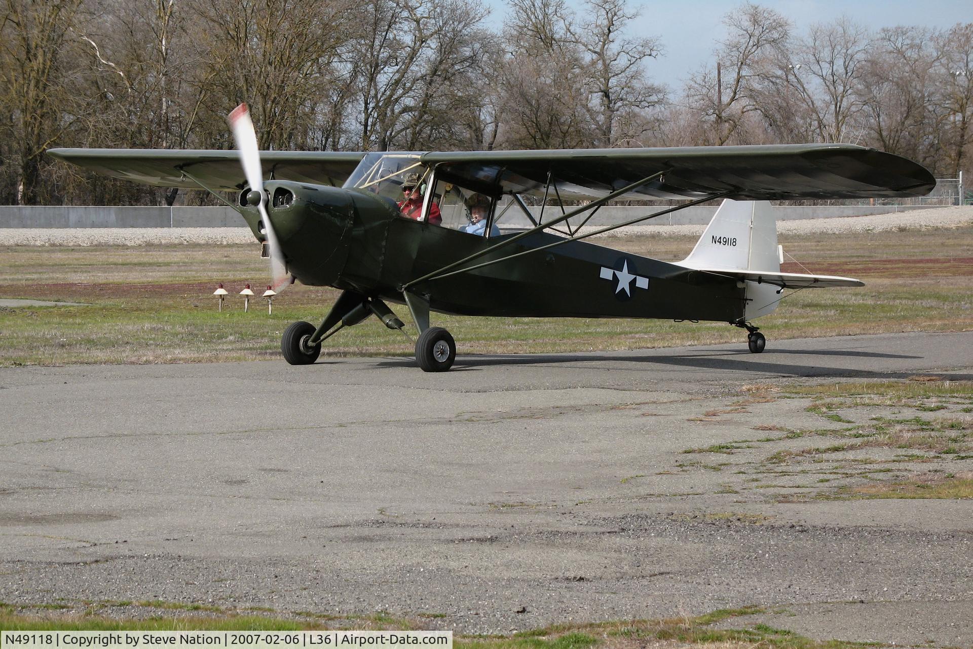 N49118, 1943 Taylorcraft L-2M Grasshopper C/N L-5242, Locally-based 1943 Taylorcraft L-2M Grasshopper painted in WWII USAAC colors taxiing @ Rio Linda Airport, CA