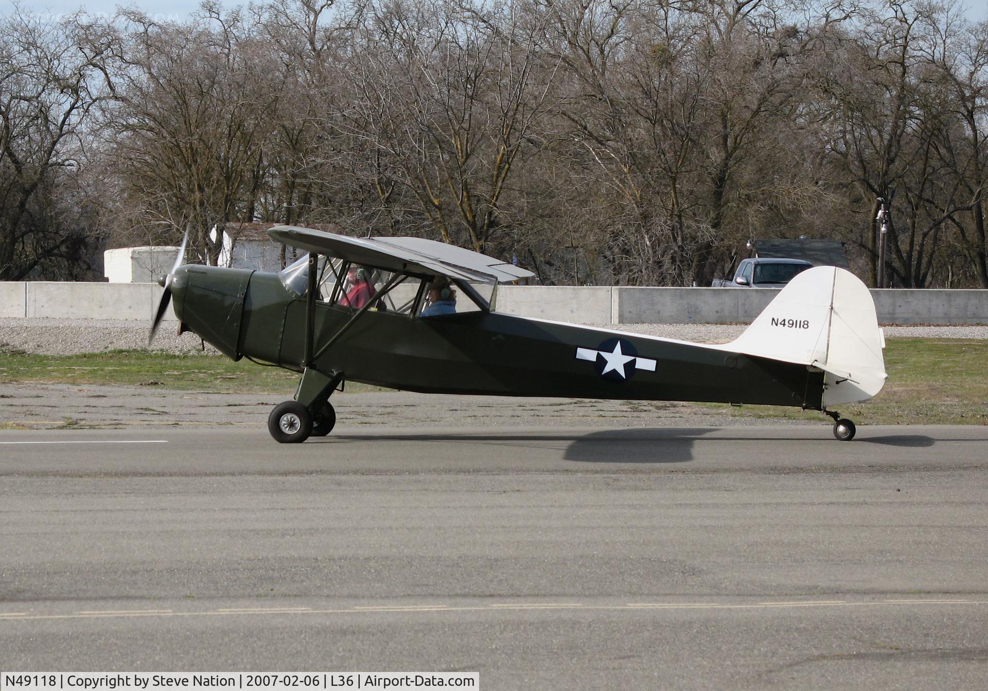 N49118, 1943 Taylorcraft L-2M Grasshopper C/N L-5242, Locally-based 1943 Taylorcraft L-2M Grasshopper painted in WWII USAAC colors taxiing @ Rio Linda Airport, CA