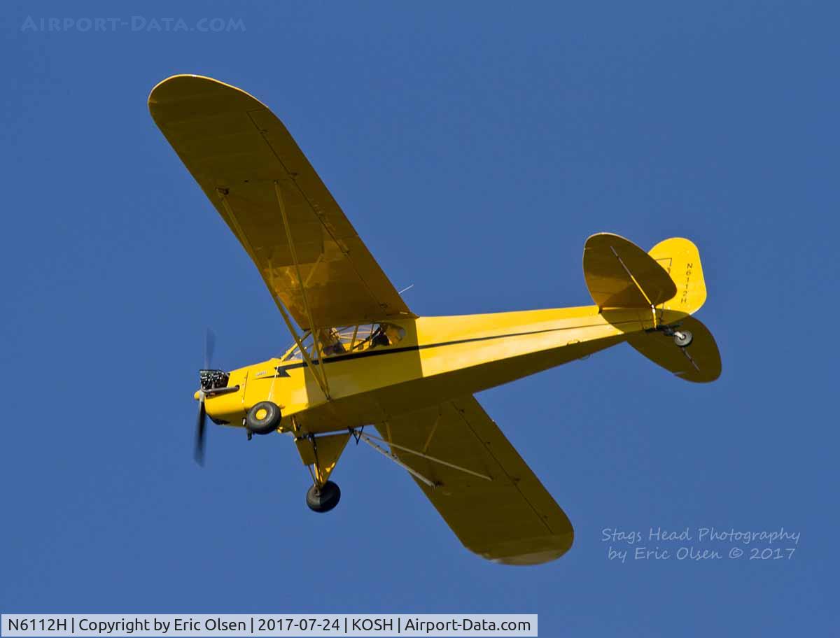 N6112H, 1946 Piper J3C-65 Cub Cub C/N 19273, Piper over Oshkosh