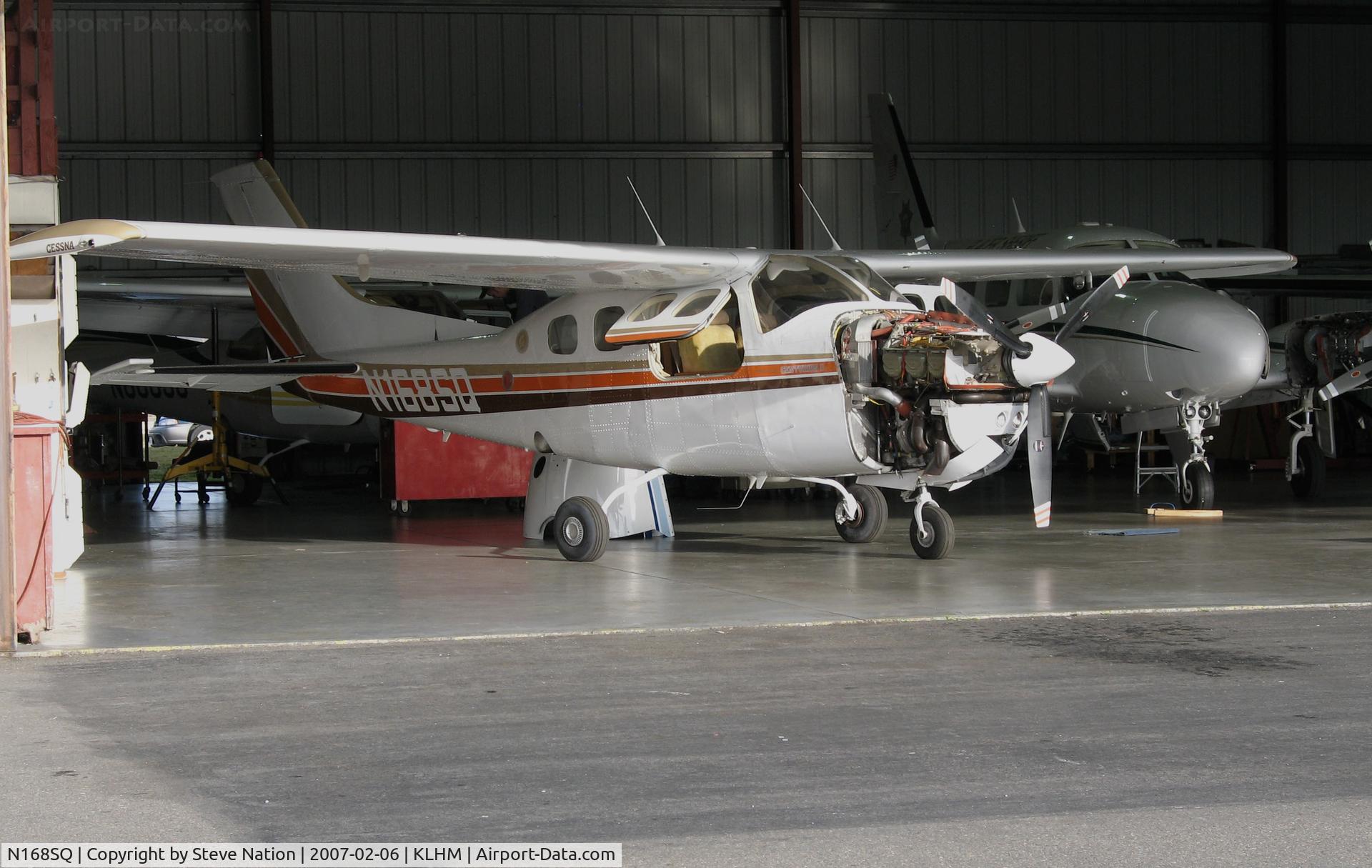 N168SQ, 1979 Cessna P210N Pressurised Centurion C/N P21000460, Locally-based 1979 Cessna P210N Pressurized Centurion with hangar door open@ Lincoln Regional Airport (Karl Harder Field), CA (to ASD Aviation, Carson City, NV 2008-05-28 as N168SD)