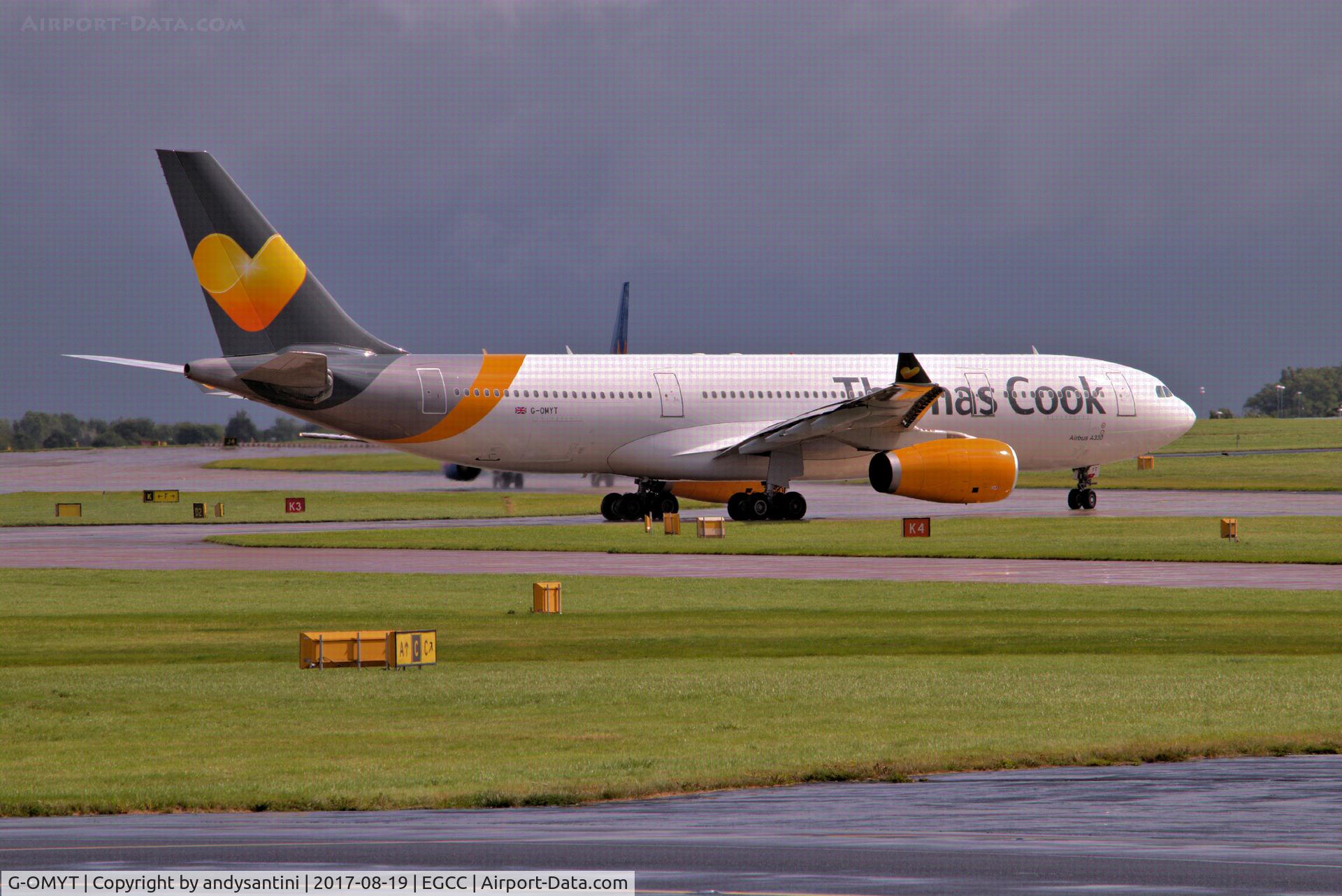 G-OMYT, 1999 Airbus A330-243 C/N 301, taxing out for take off @ egcc