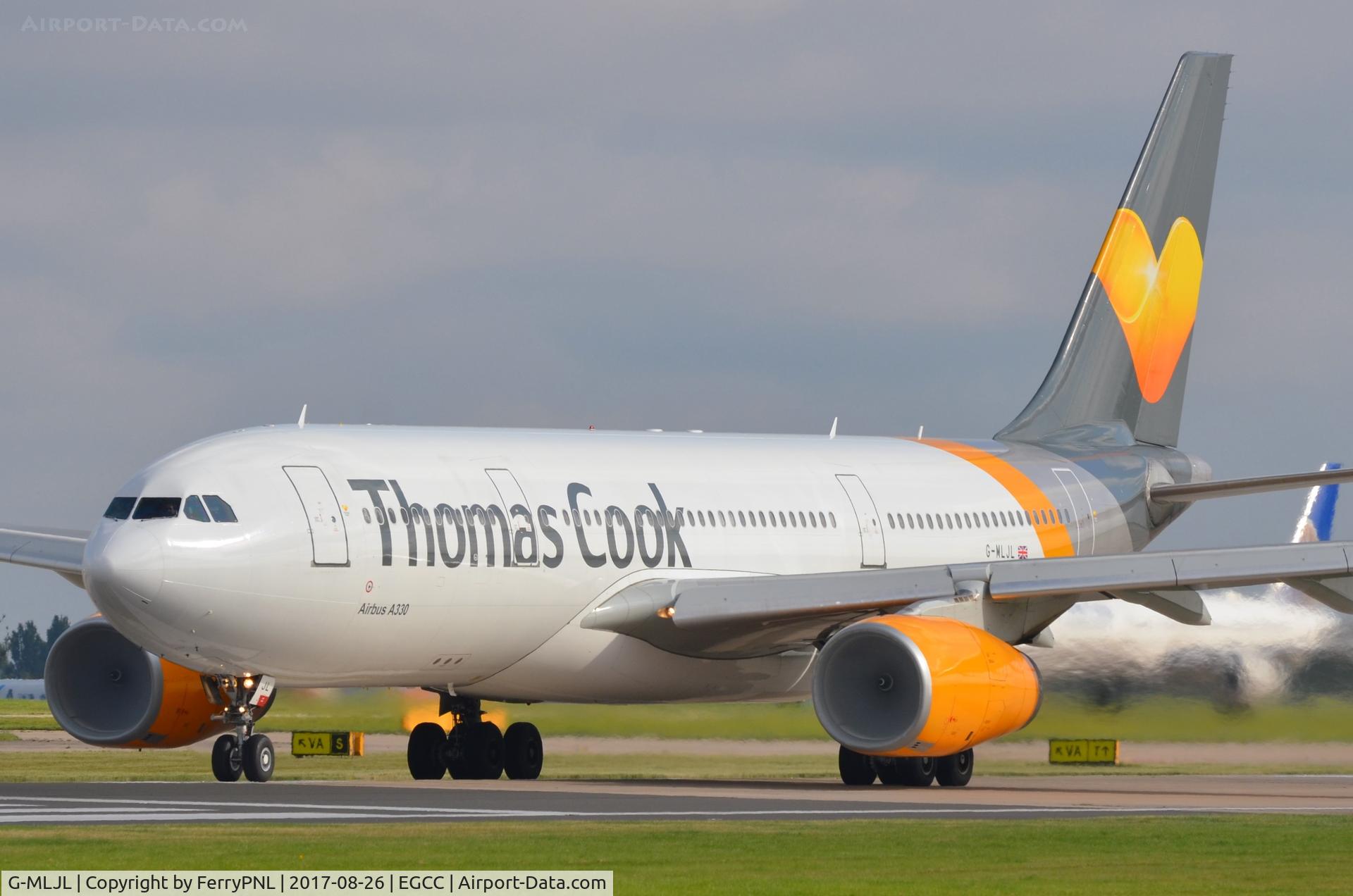 G-MLJL, 1999 Airbus A330-243 C/N 254, Thomas Cook A332 inhaling moist air while powering up.