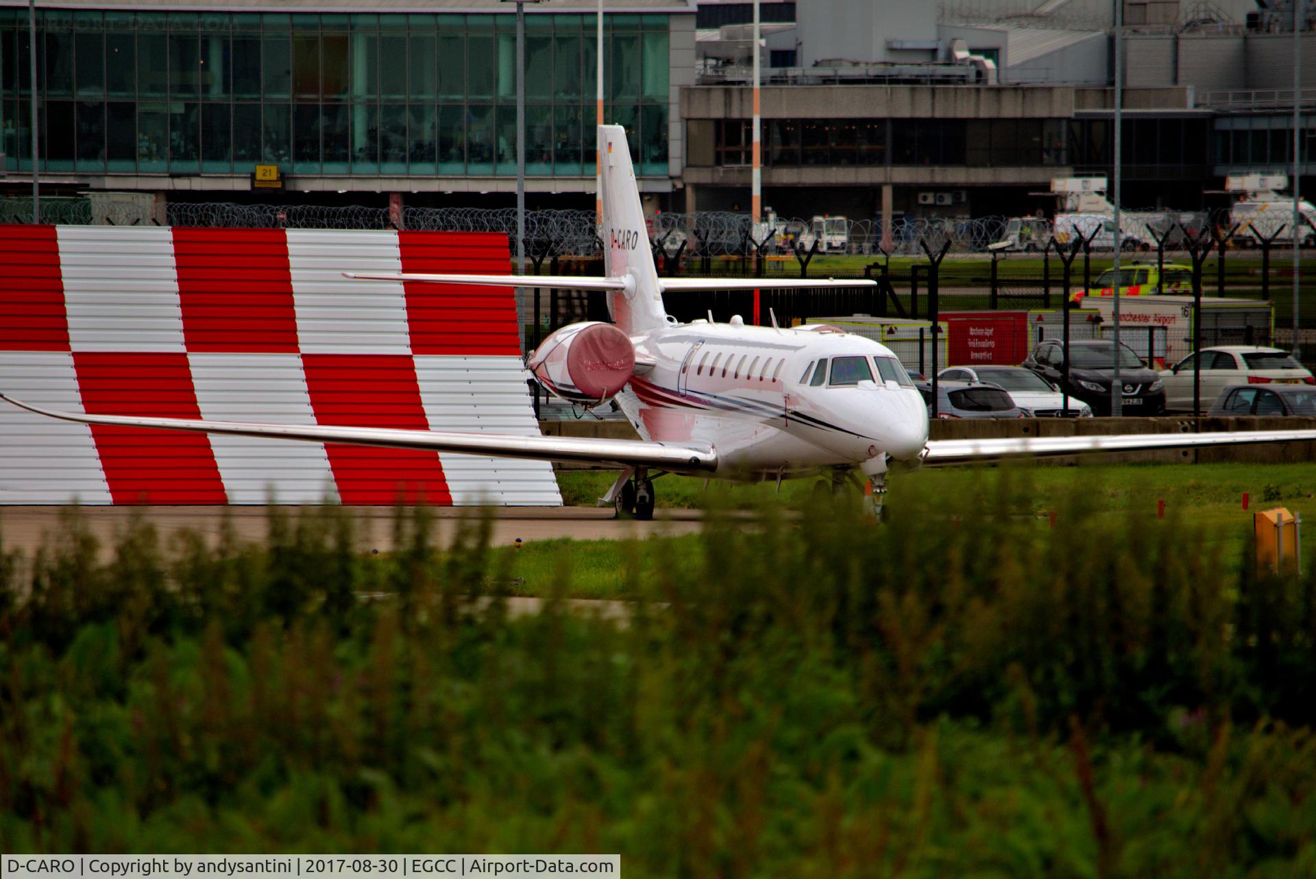 D-CARO, 2013 Cessna 680 Citation Sovereign C/N 680-0514, parked up on the [FBO] exc ramp @egcc uk.