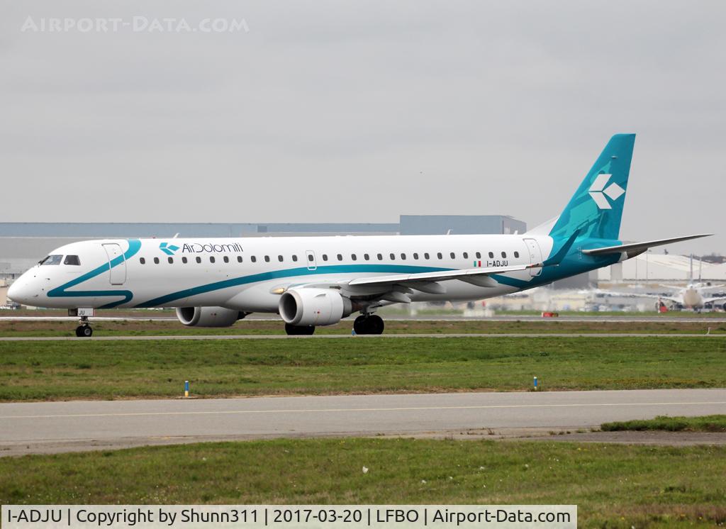 I-ADJU, 2009 Embraer 195LR (ERJ-190-200LR) C/N 19000290, Taxiing holding point rwy 32R for departure...