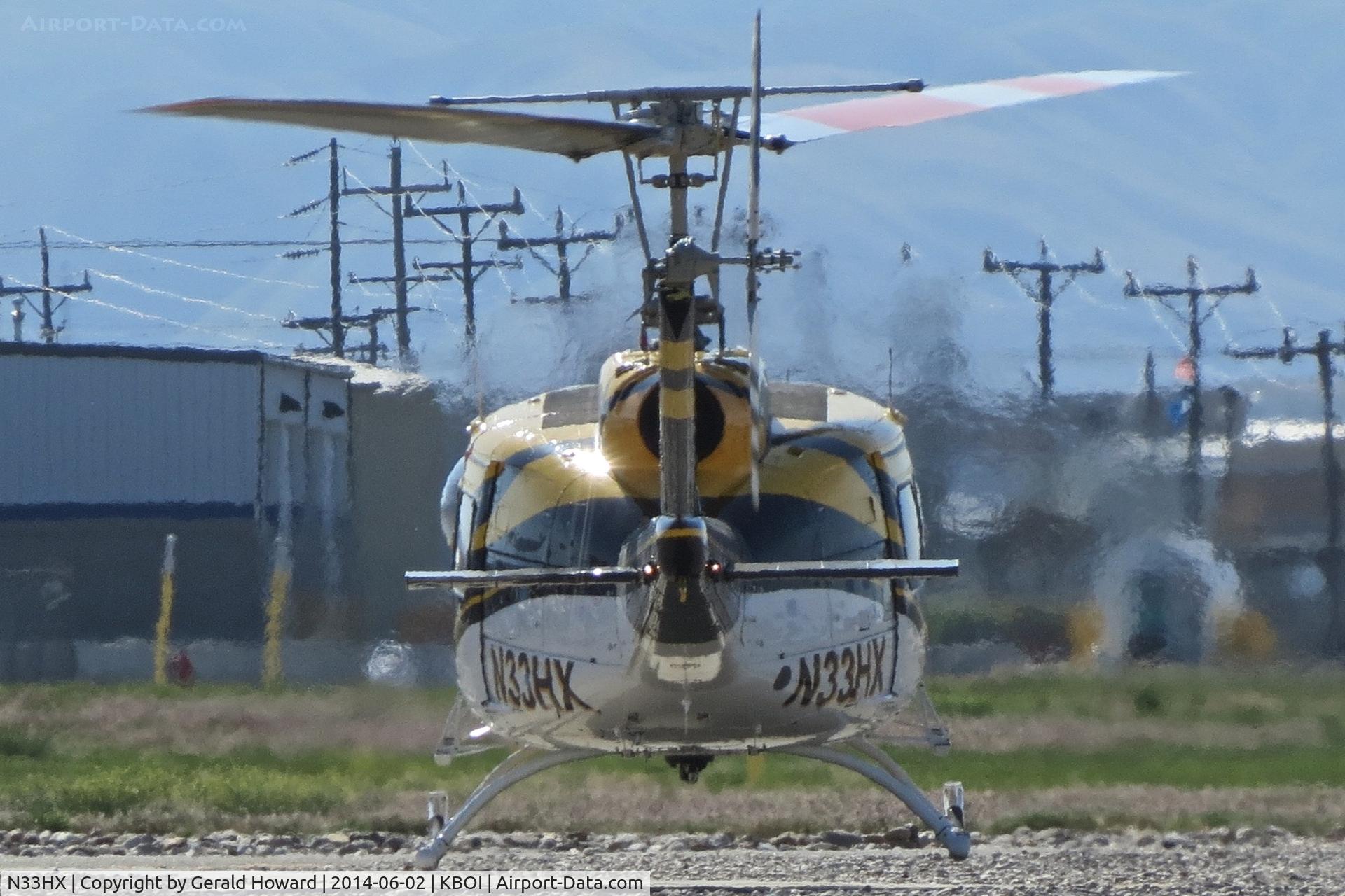 N33HX, 1976 Bell 205A-1 C/N 30235, Practice in the northeast field.