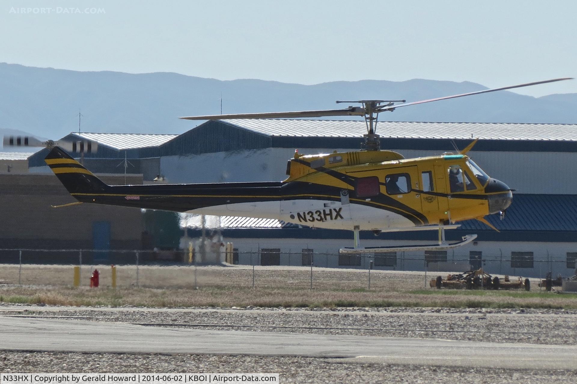 N33HX, 1976 Bell 205A-1 C/N 30235, Practice in the northeast field.